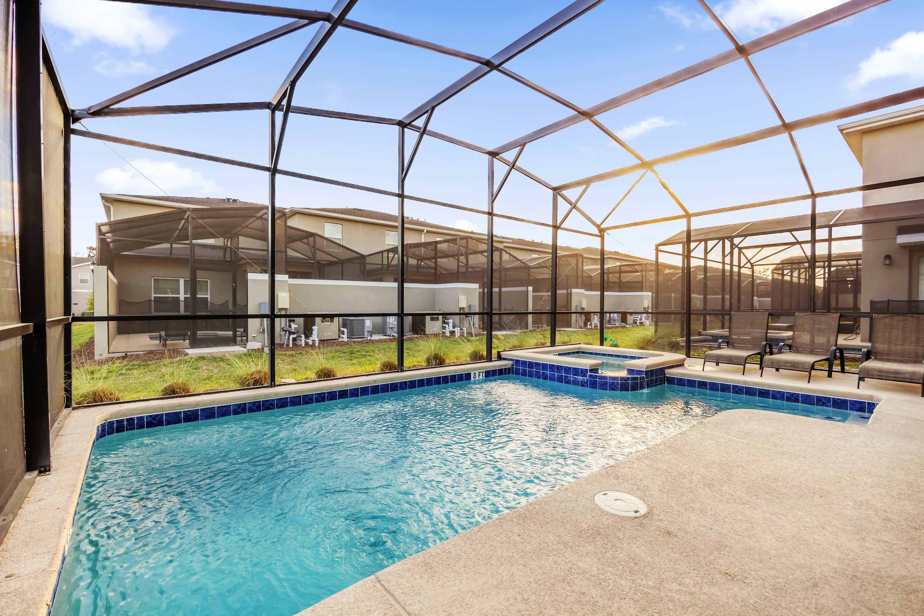Relax in your private screened pool and hot tub, perfect for unwinding after a day of adventure.