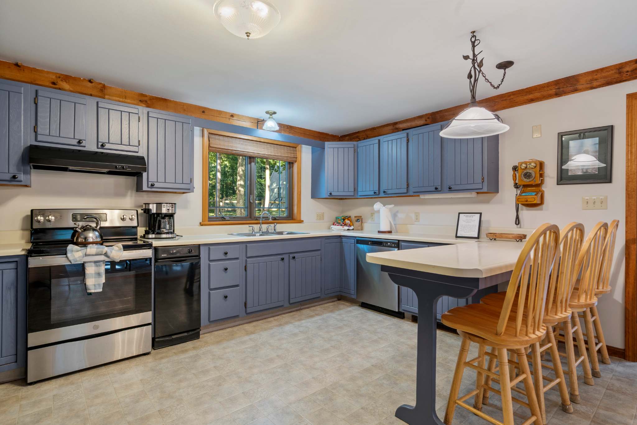 The open kitchen offers ample space & all the comforts of home​