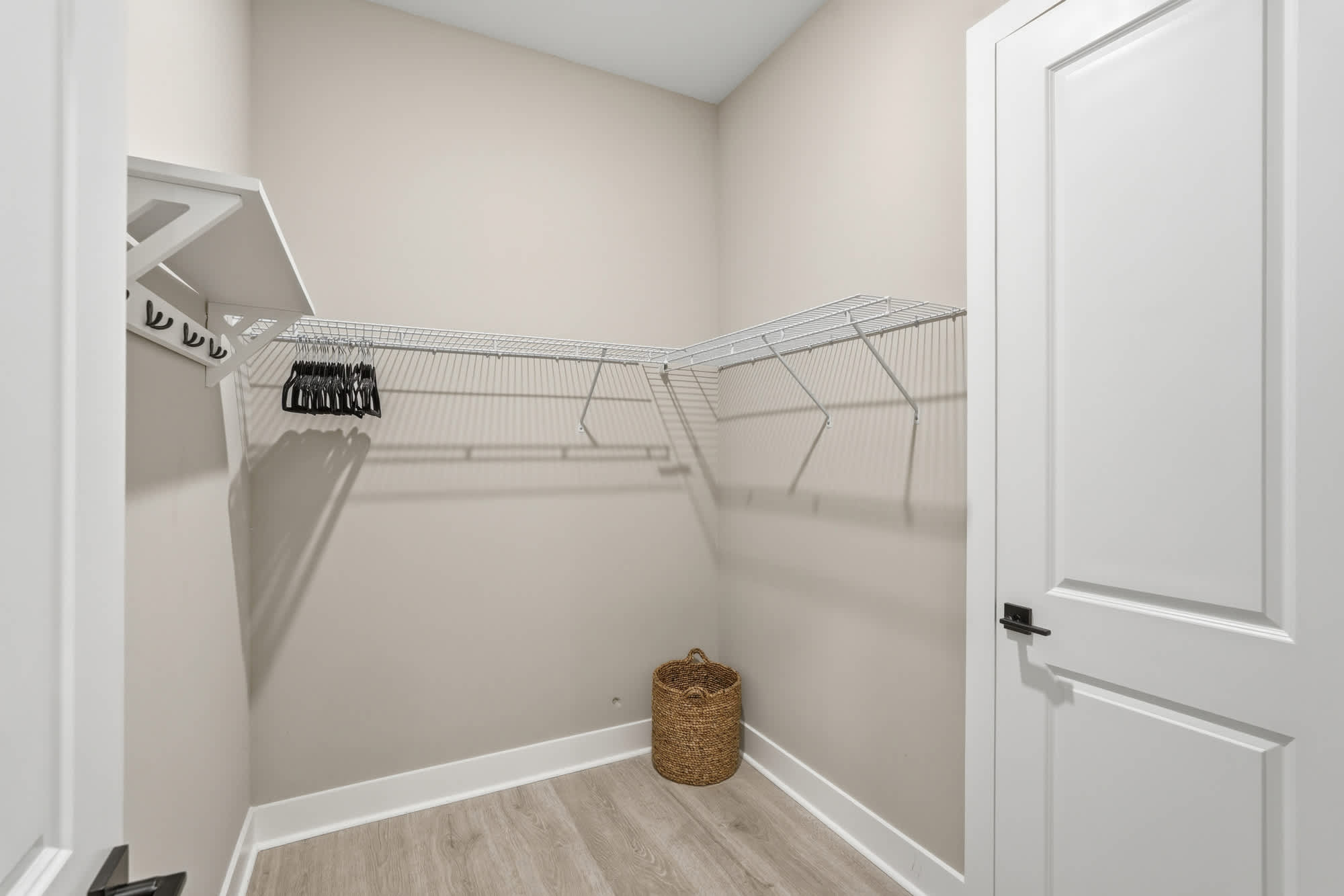 38 W Willow Mist Rd – Walk-in closet with wire shelving, hanging space, and a woven basket on the floor.