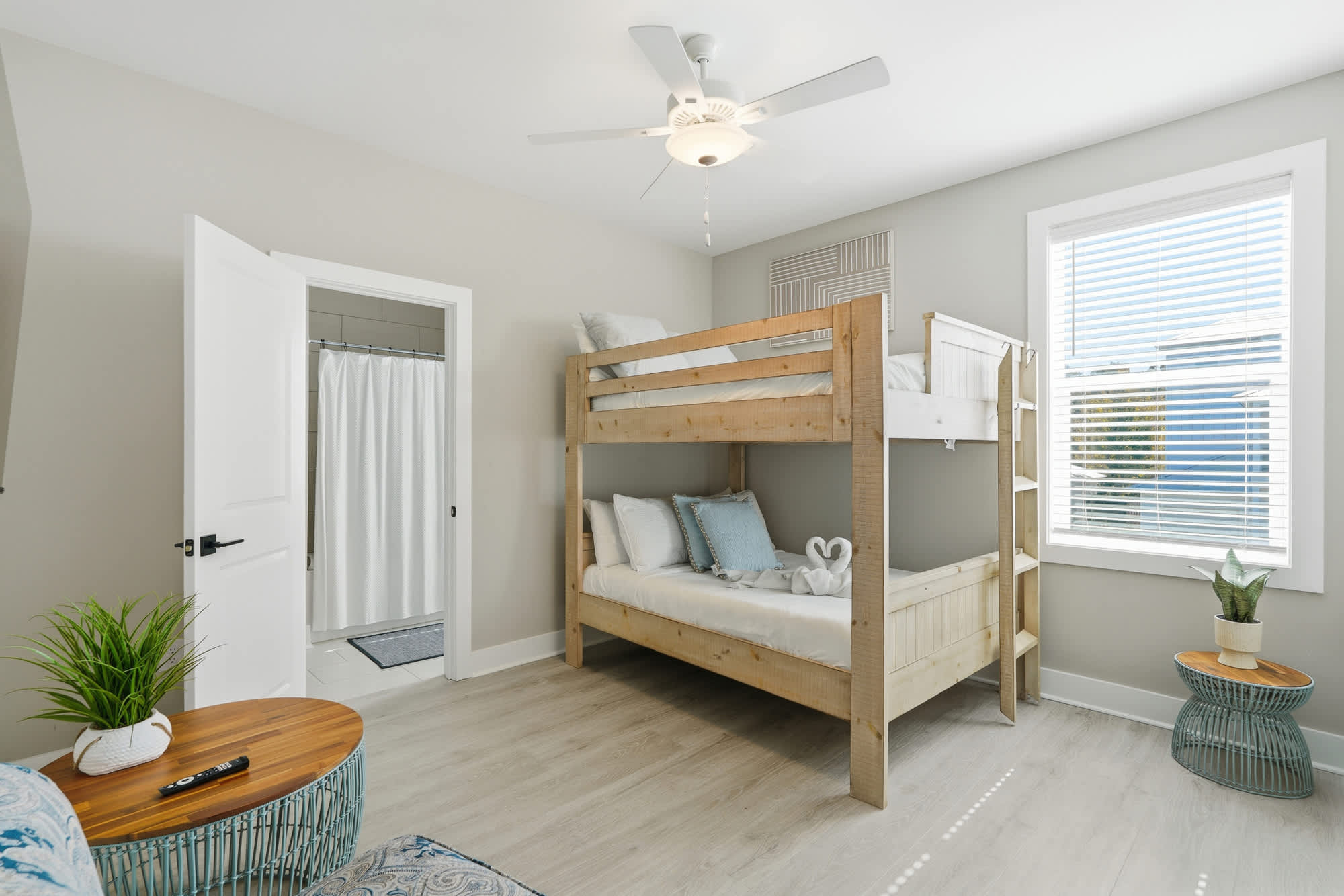 38 W Willow Mist Rd – Bunk bed room with shower area, ceiling fan, and window with blinds.