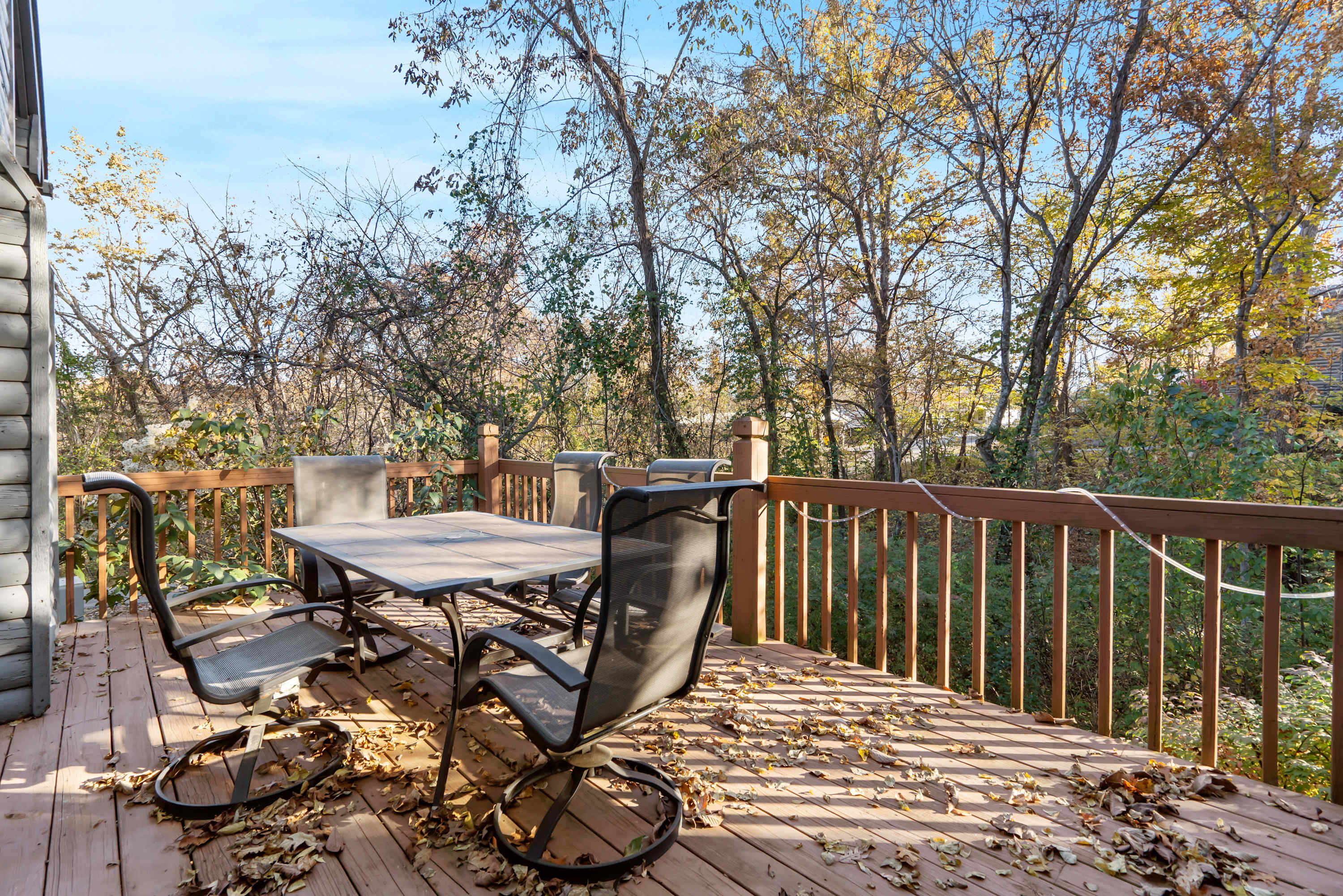 Lounge the day away or dine alfresco with treetop views on the deck​