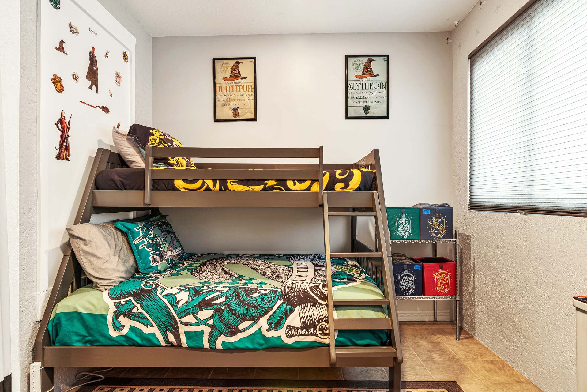 Magical themed bedroom with cozy bunk beds perfect for young wizards and witches. A delightful space for fans to enjoy!