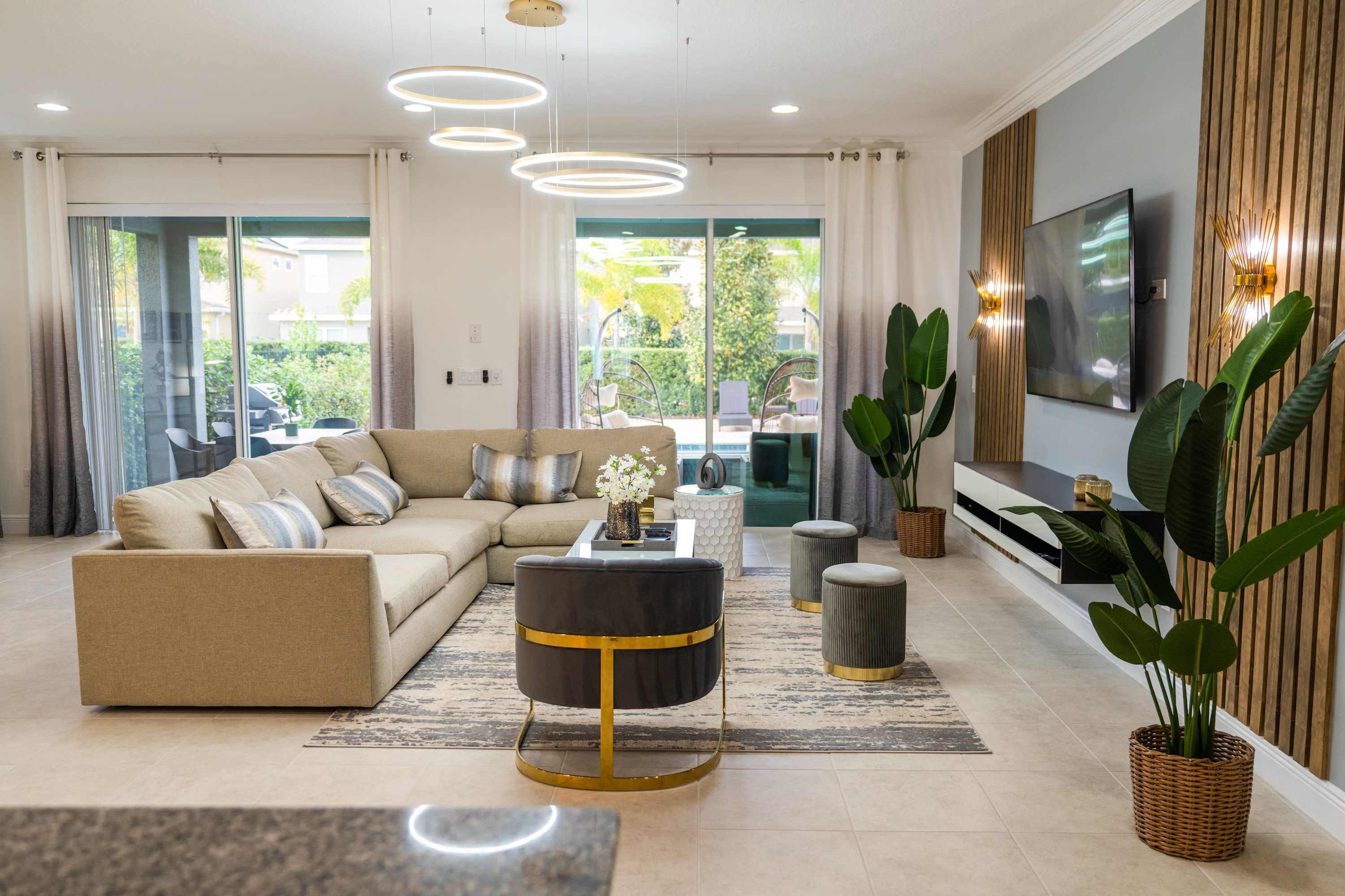 Elegant living room with modern decor and seamless indoor-outdoor flow, perfect for relaxation and entertainment.