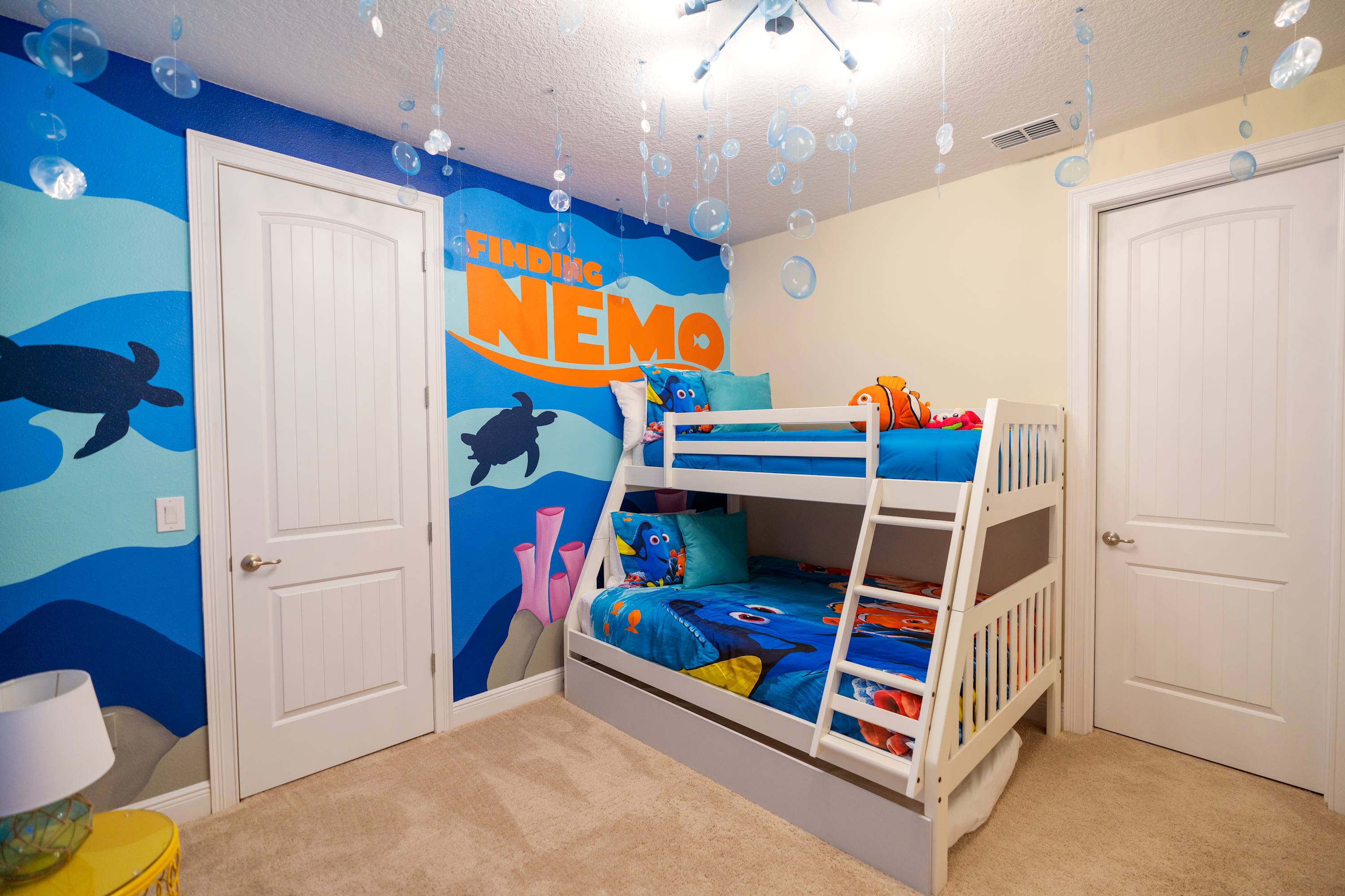 Dive into adventure in this 'Finding Nemo' themed room, perfect for kids to explore and dream!