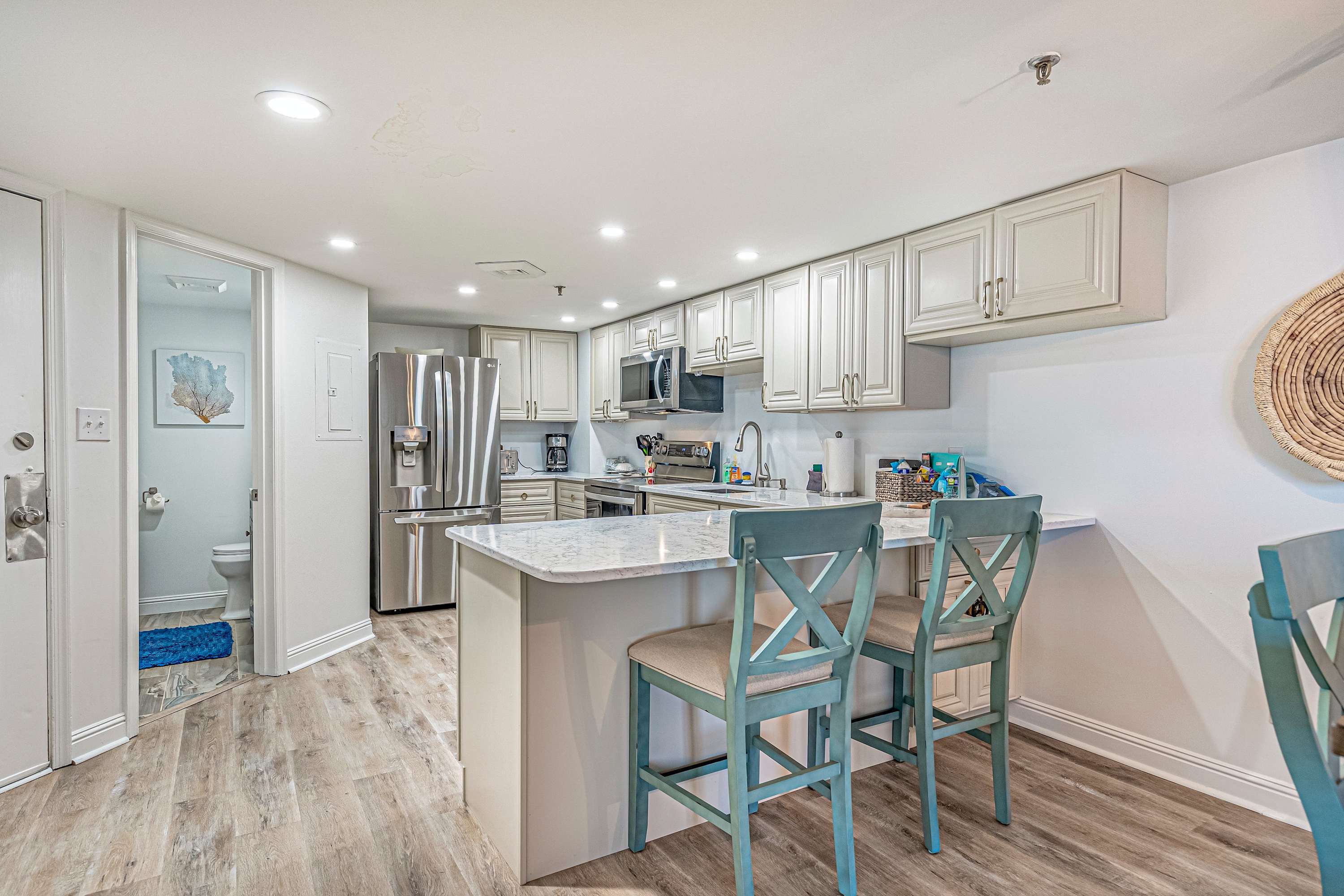 Kitchen with island seating for 2