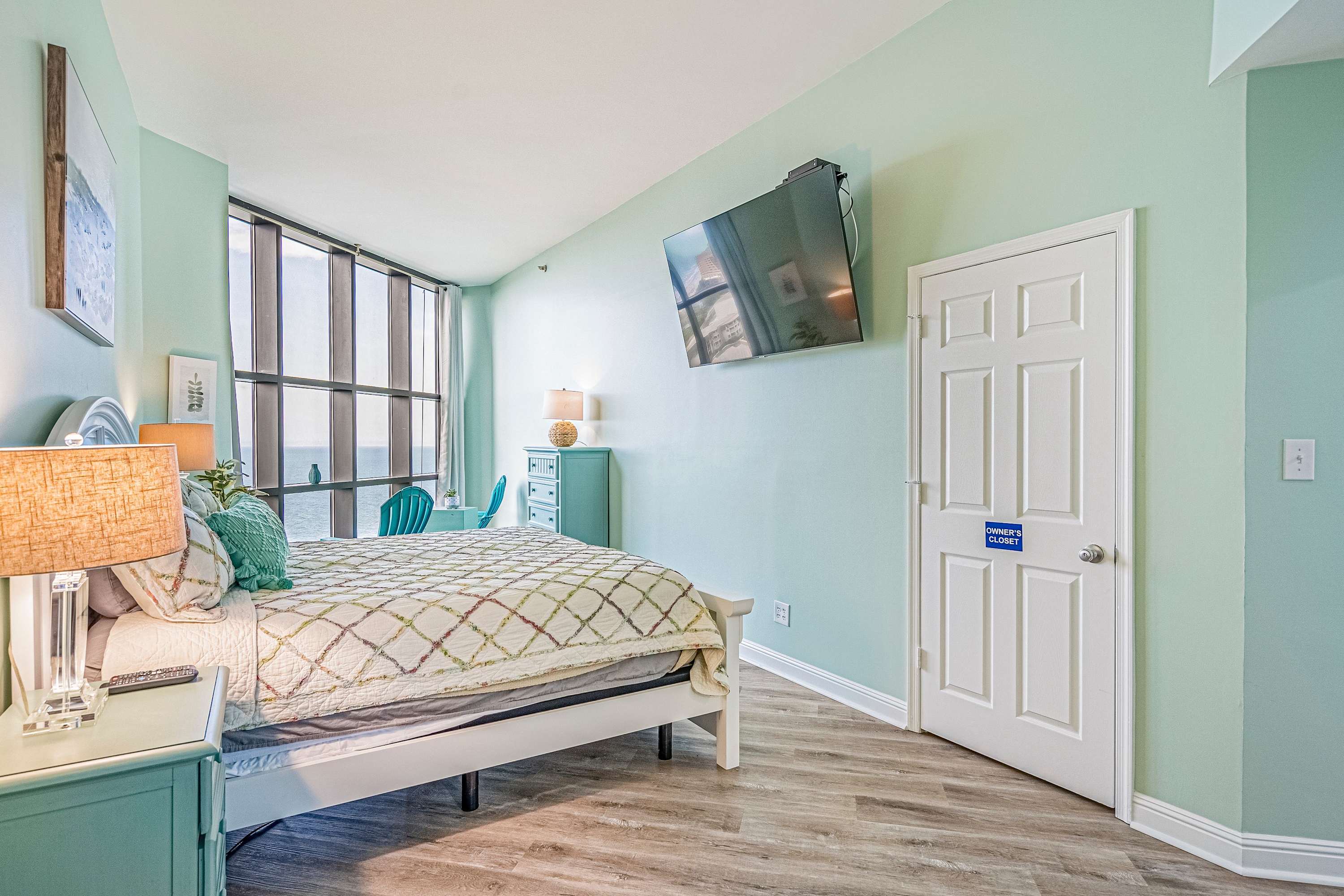 Bedroom 1 with a TV and a view