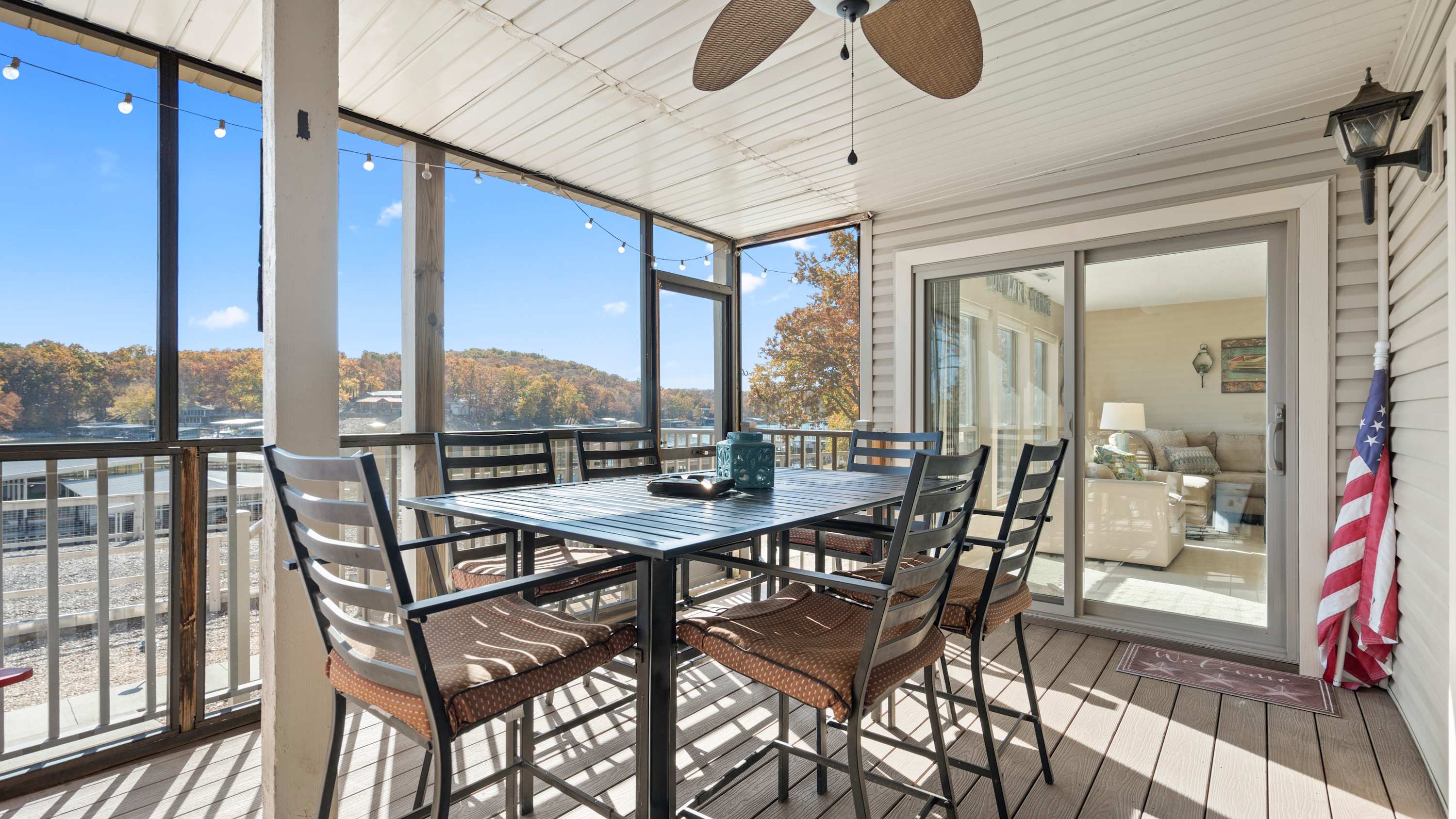 Lounge the day away or dine alfresco with water views on the screened in deck​