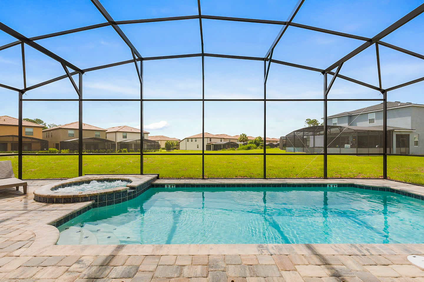 Relax in your private screened-in pool and hot tub, perfect for unwinding after a day of adventure.