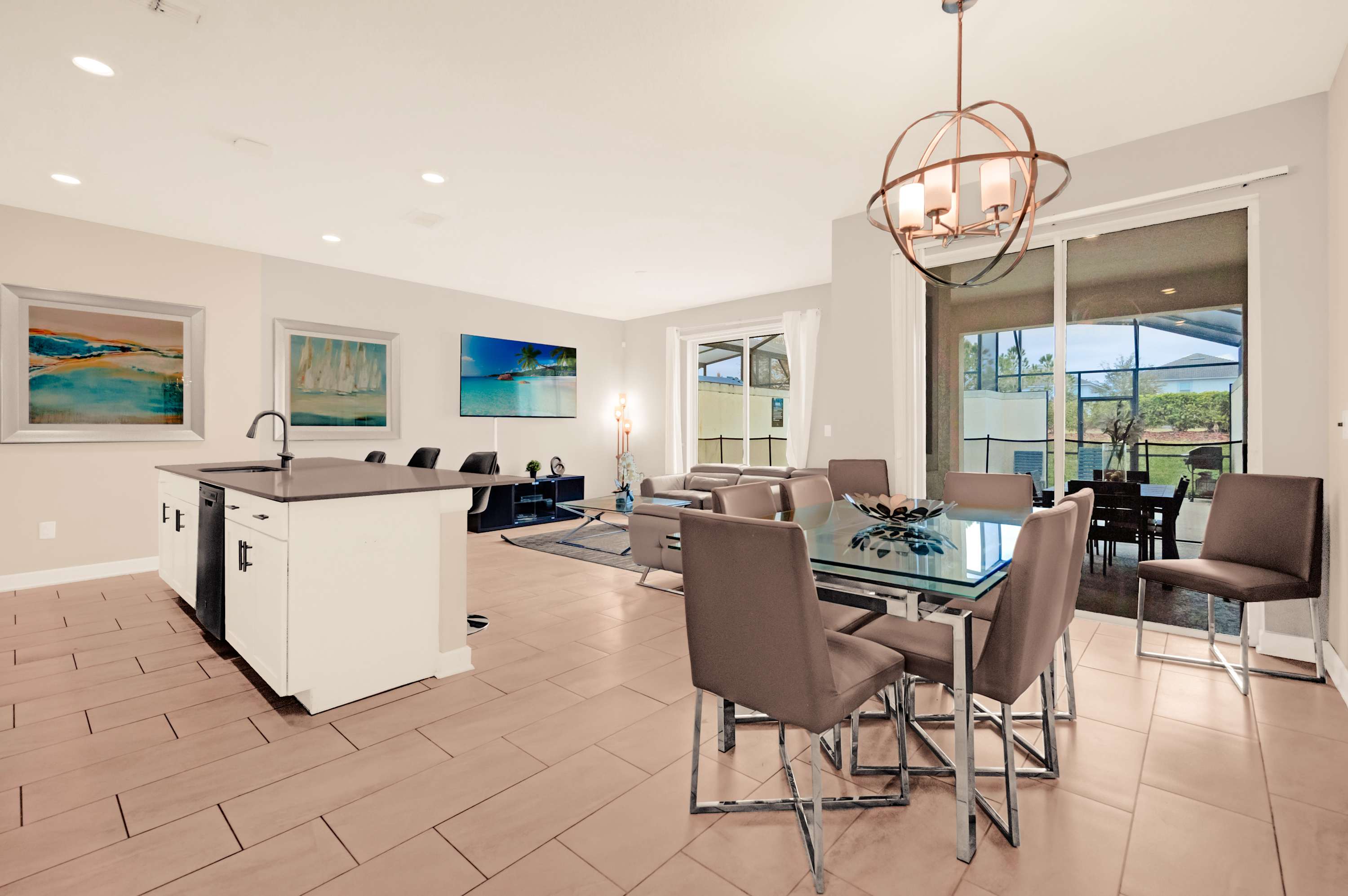 Spacious open-plan living area with modern amenities and a seamless indoor-outdoor flow, perfect for relaxation and entertaining.