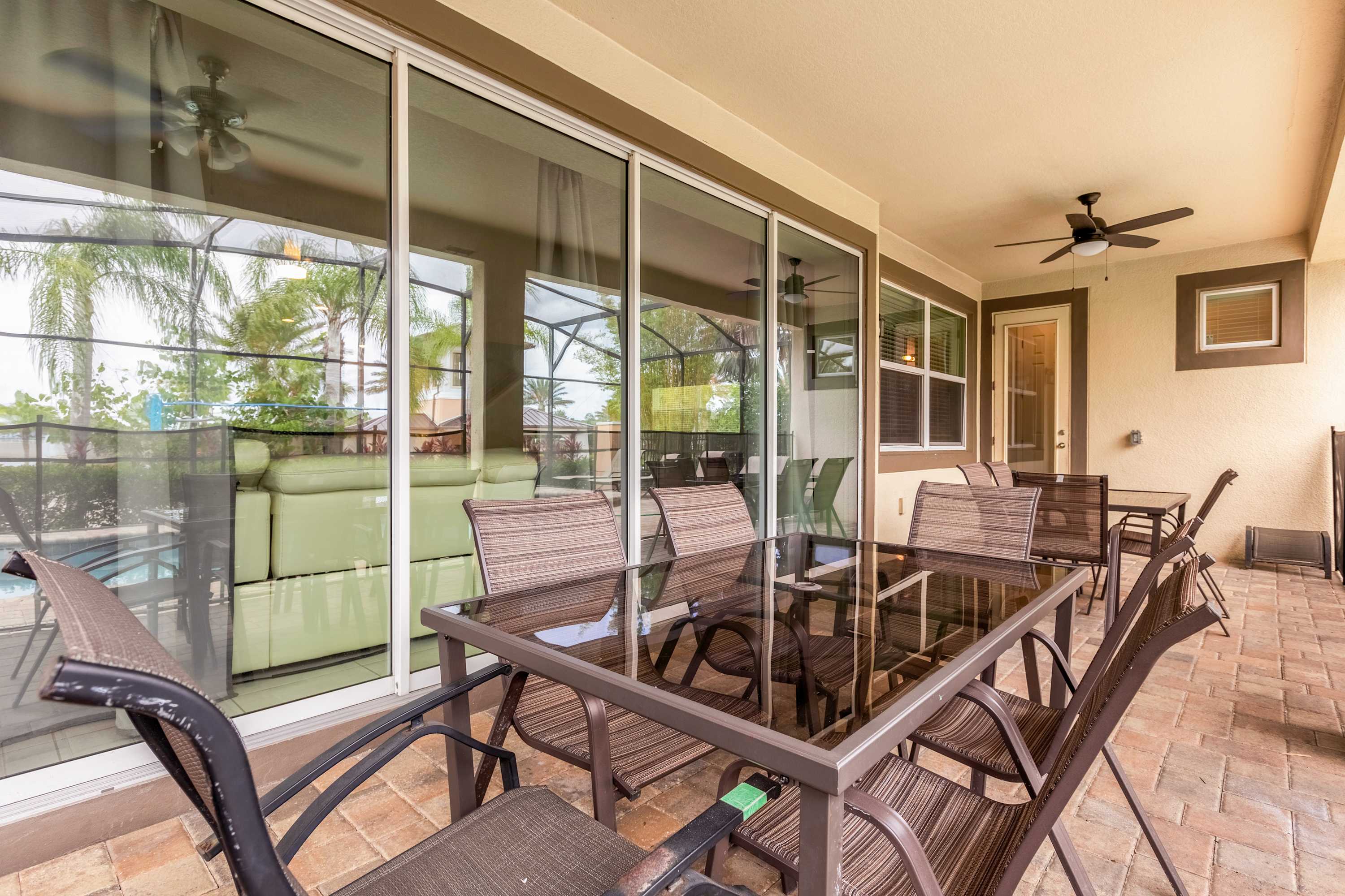 Relax on the spacious patio with a pool view, perfect for outdoor dining and gatherings.
