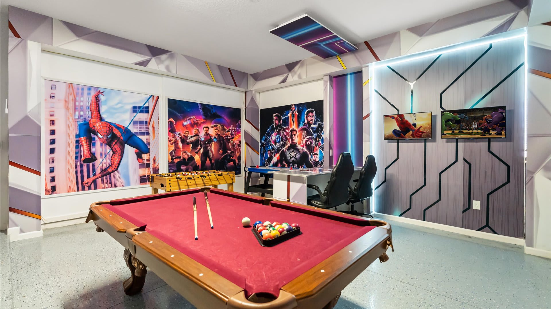 Vibrant game room featuring a pool table, air hockey, arcade games, and neon décor — hours of indoor fun for all ages.