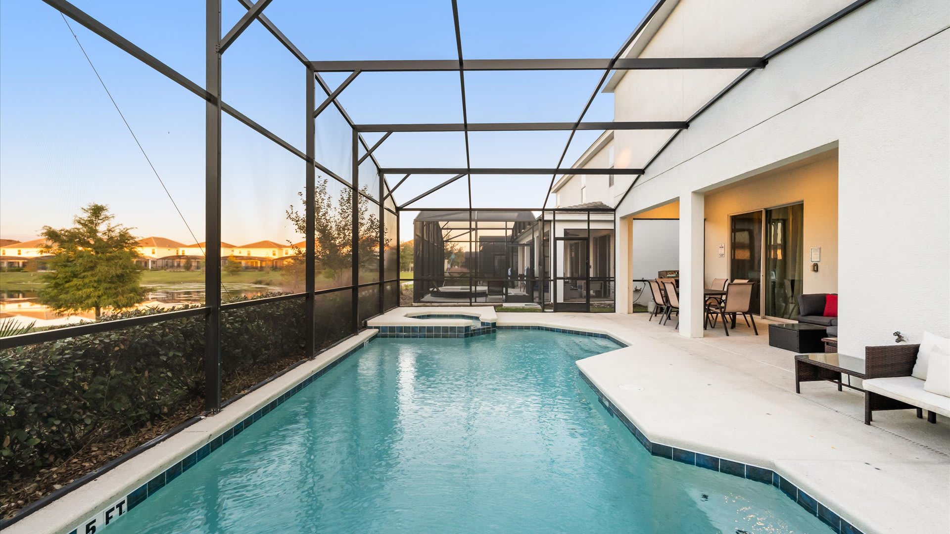 Sparkling private screened-in pool with serene views — perfect for morning swims or relaxing afternoons.