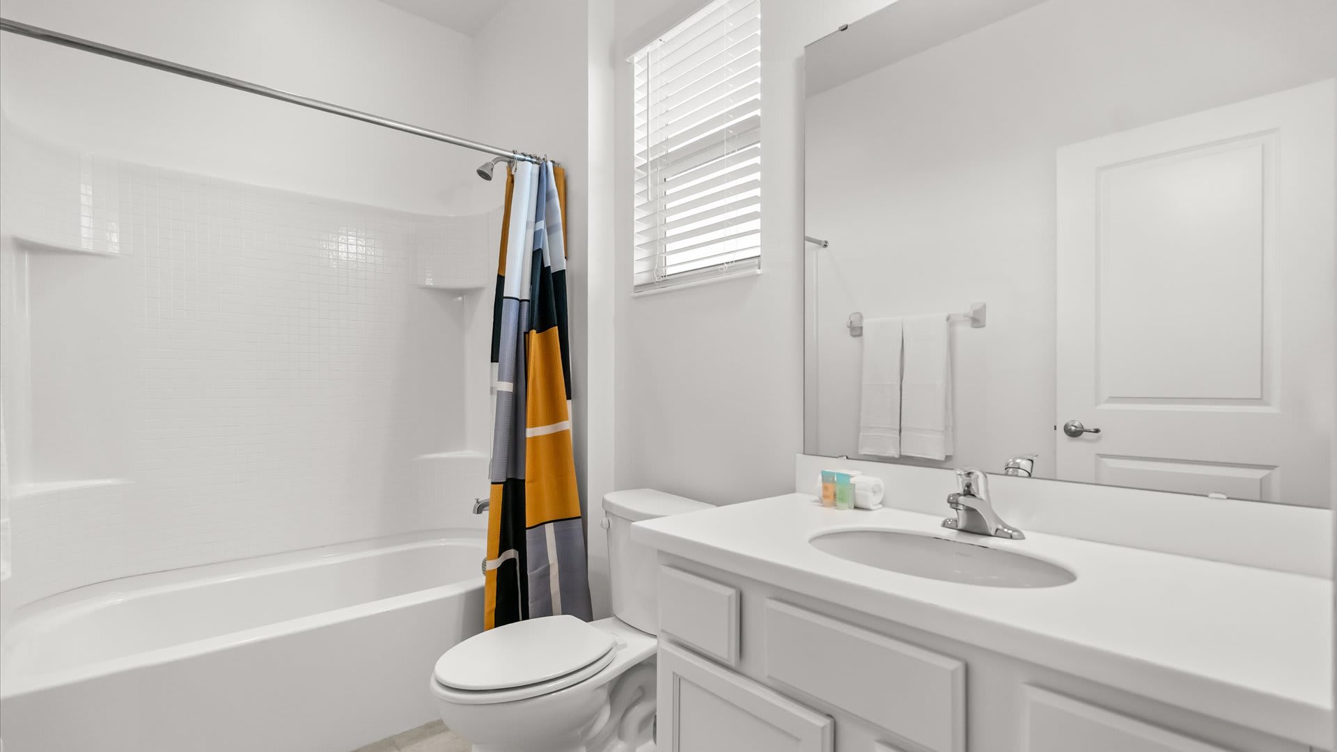 En-suite bathroom with shower + tub combo