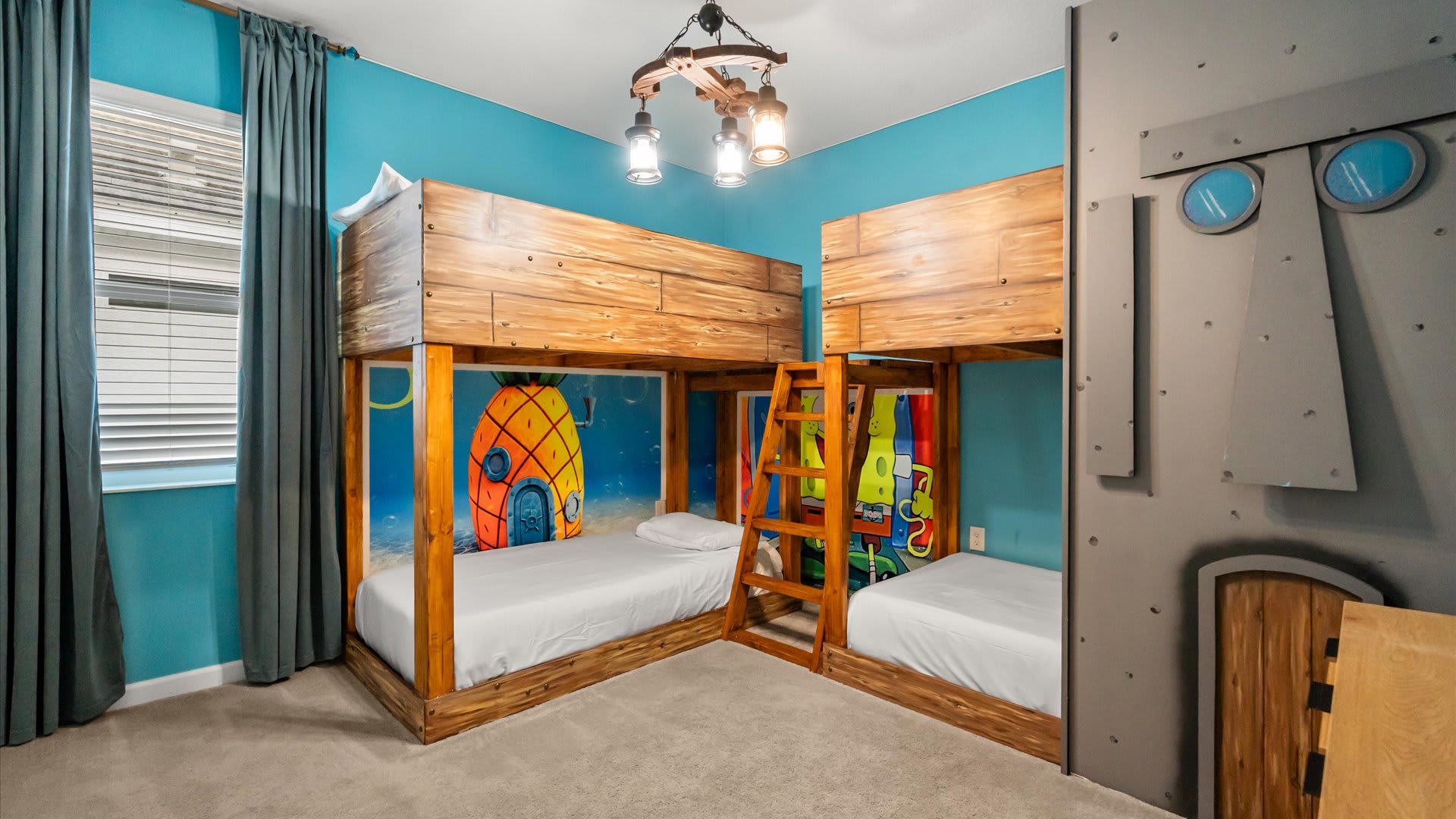 Bedroom 9 – SpongeBob twin bunk room designed with kids in mind — bright, playful, and perfect for siblings or friends. 