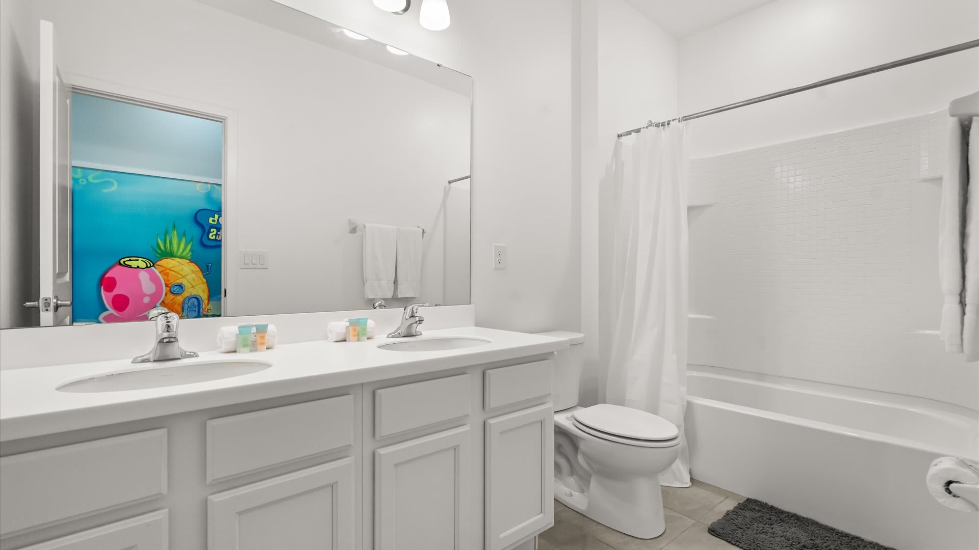 En-suite bathroom with shower + tub combo