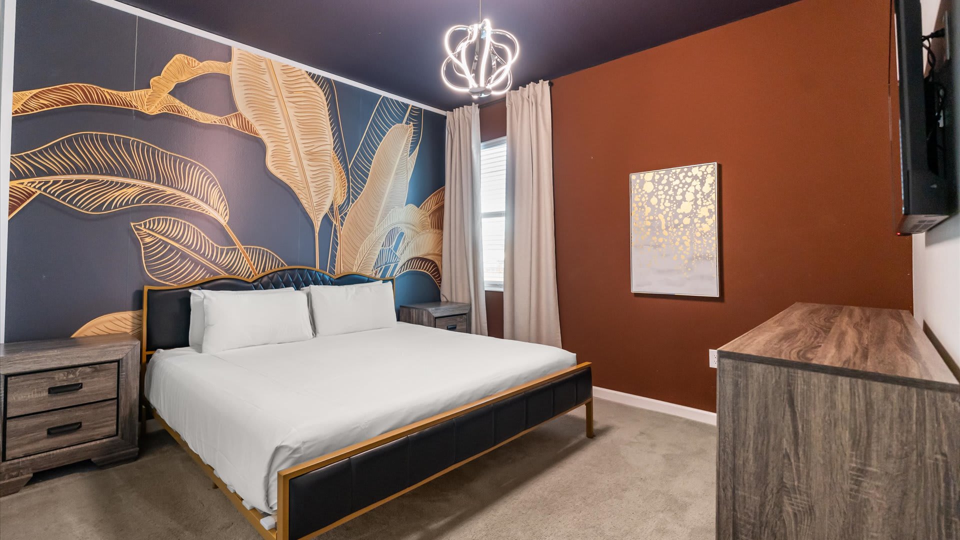 Bedroom 8 – Inviting king suite with warm tones and modern furnishings.