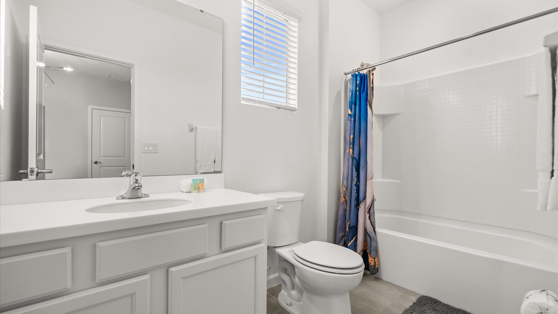 En-suite bathroom with shower + tub combo
