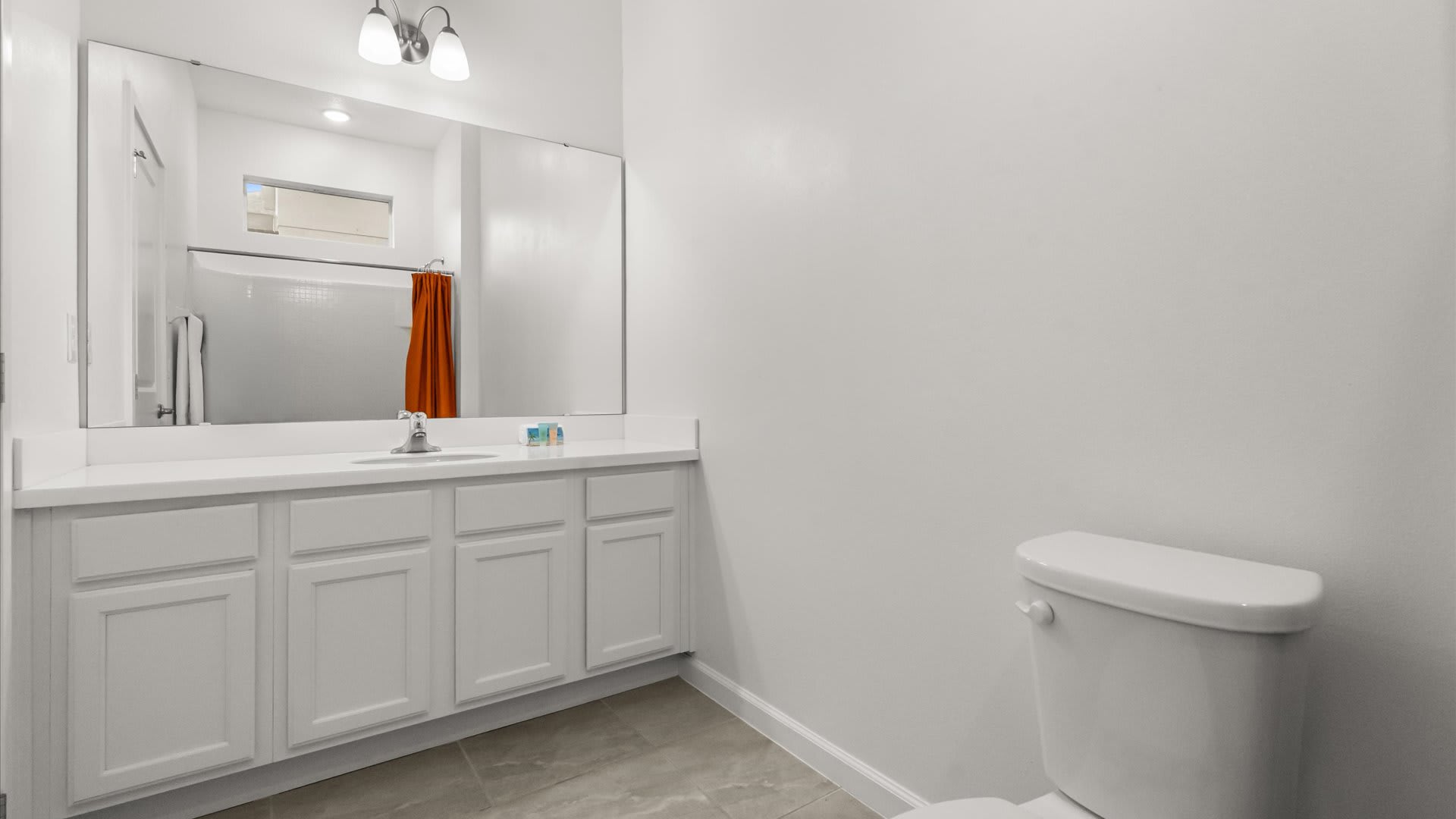 En-suite bathroom with shower + tub combo