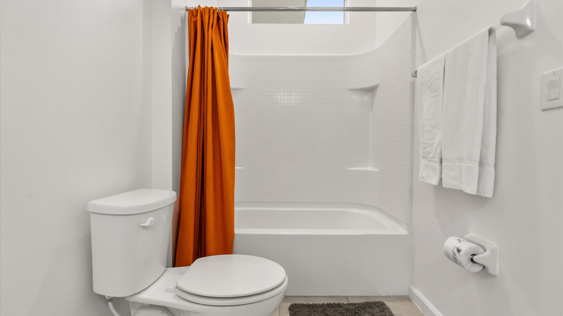 En-suite bathroom with shower + tub combo