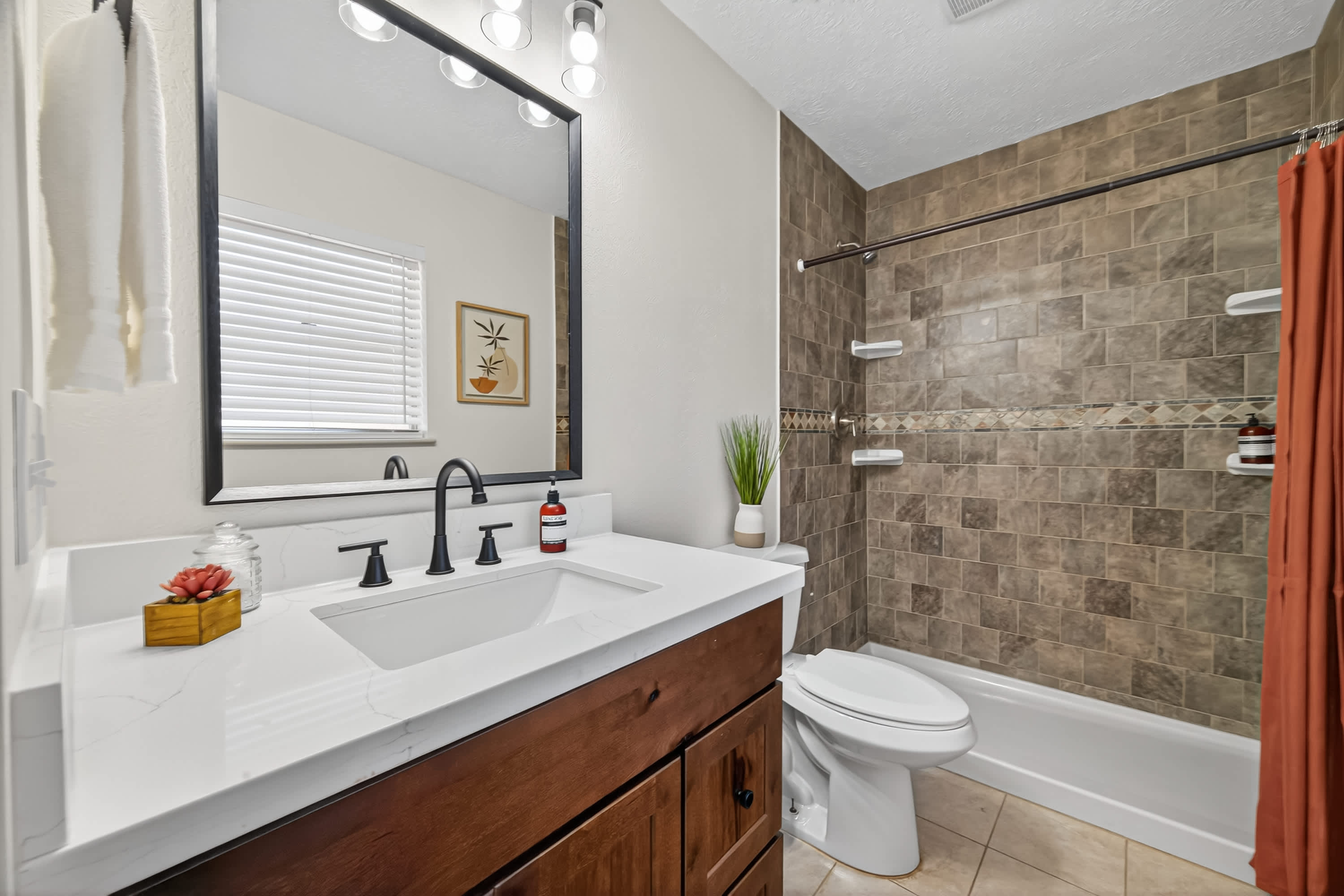 Modern 4BR Retreat w/ Private Backyard & BBQ