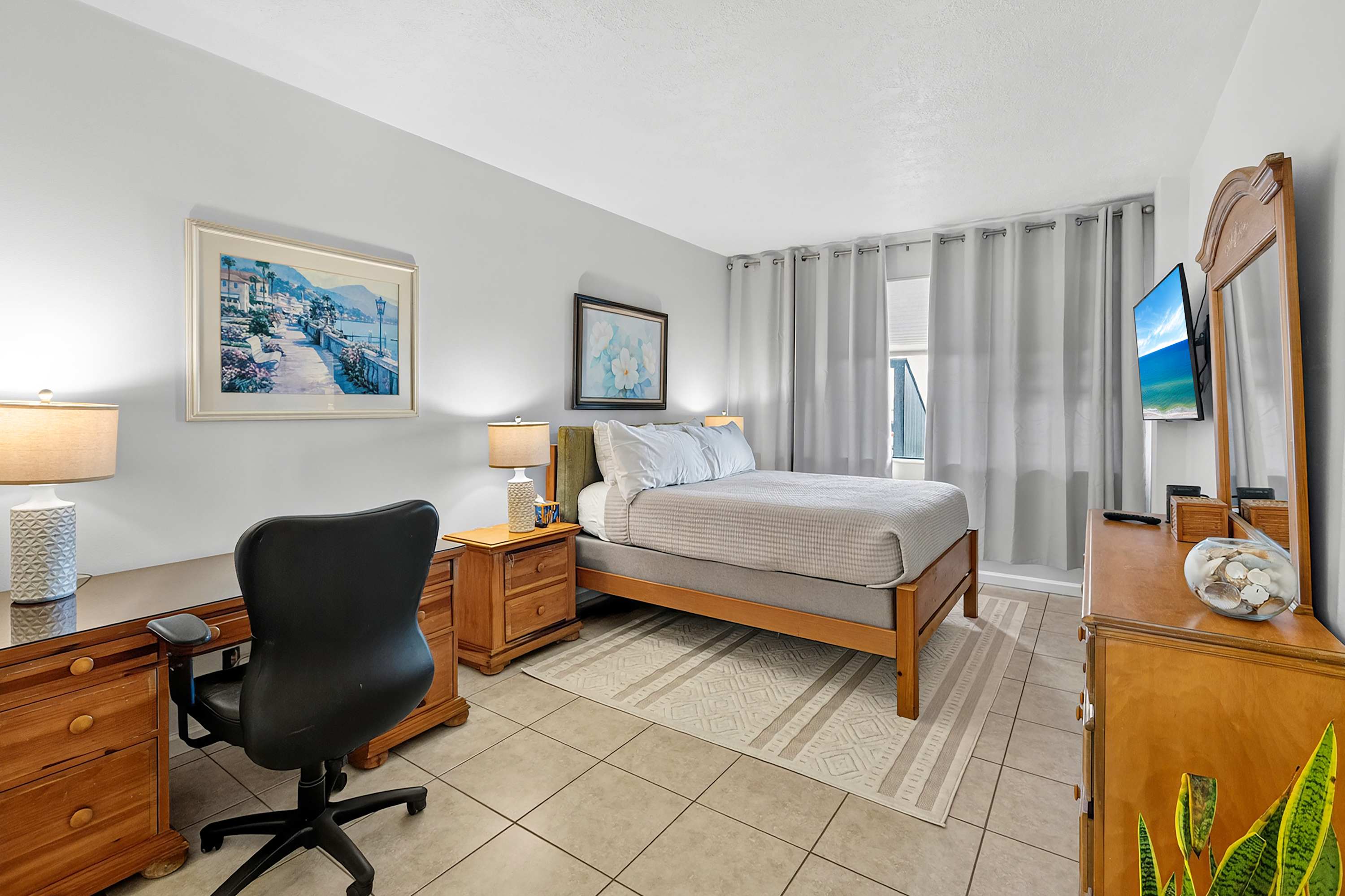 Updated 2-Bed Condo Steps from Beach