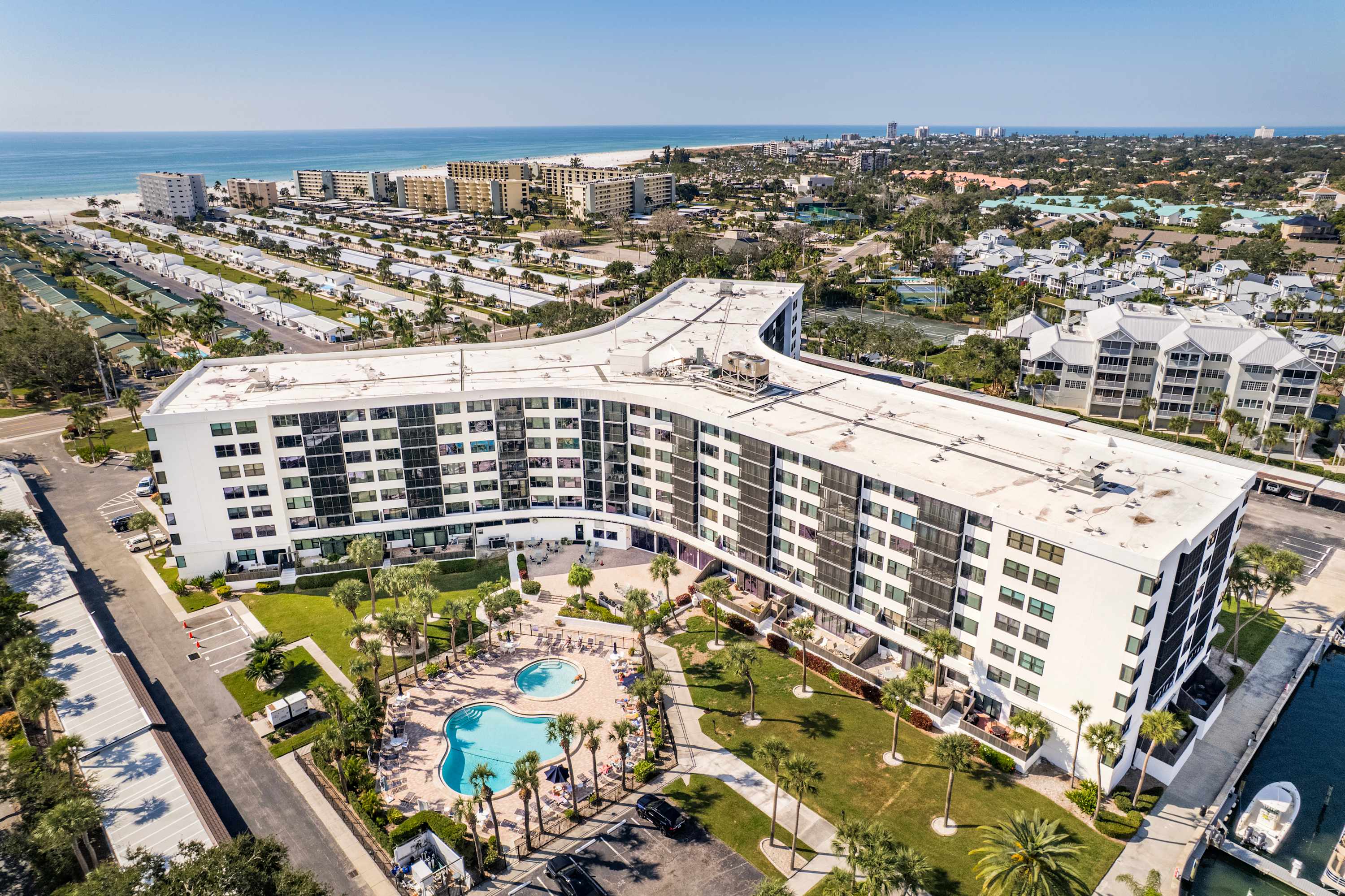 Updated 2-Bed Condo Steps from Beach