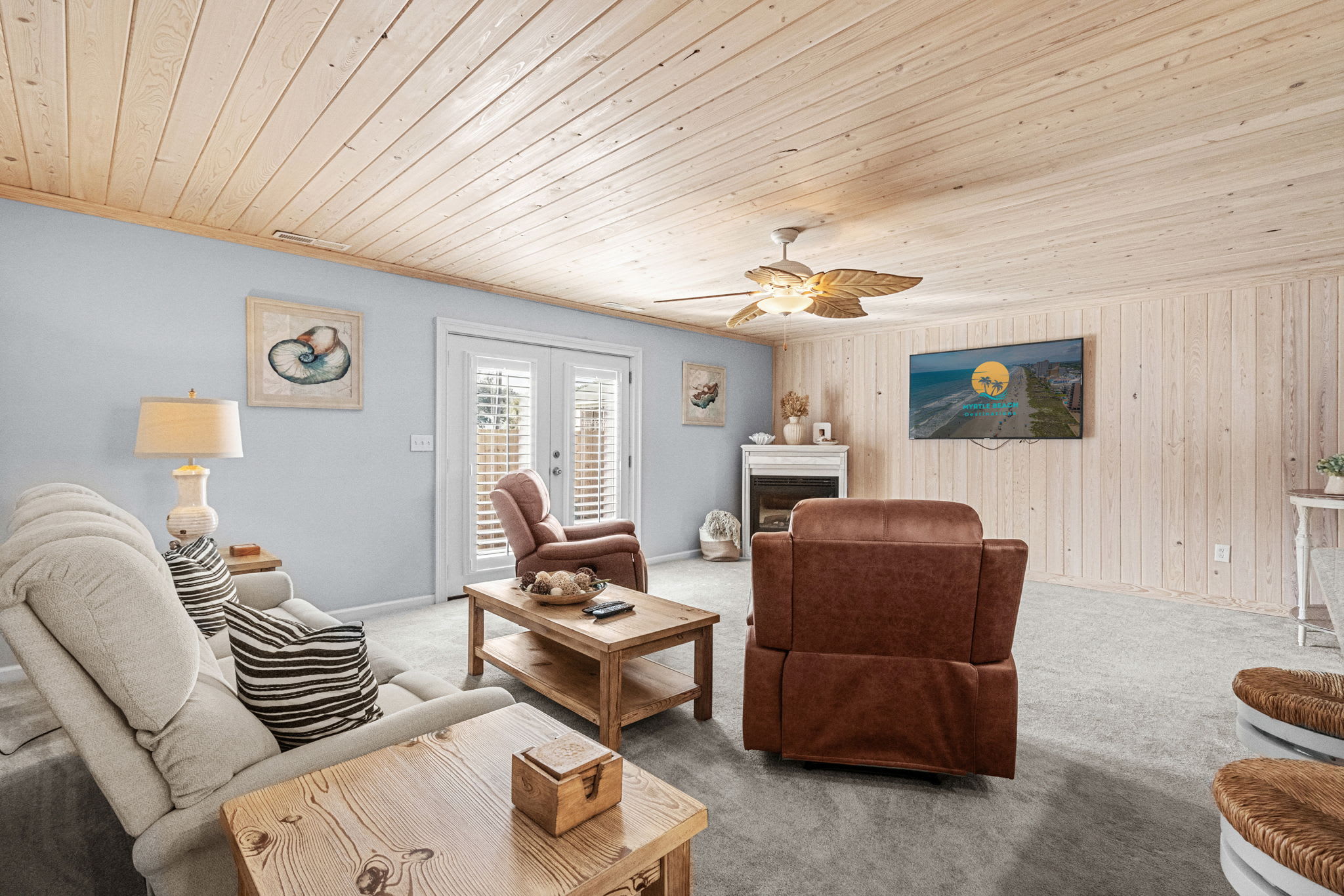 Spacious living room with multiple seating areas