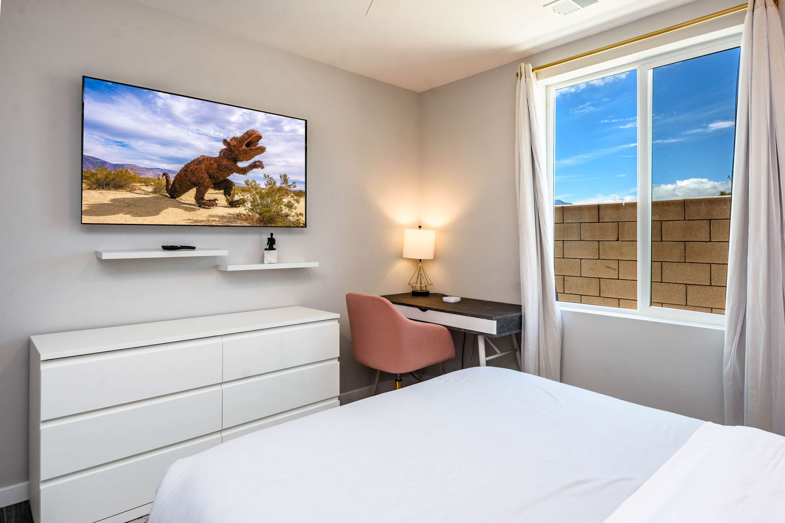 Bedroom 2 - Queen bed and dedicated workspace with desk and chair
