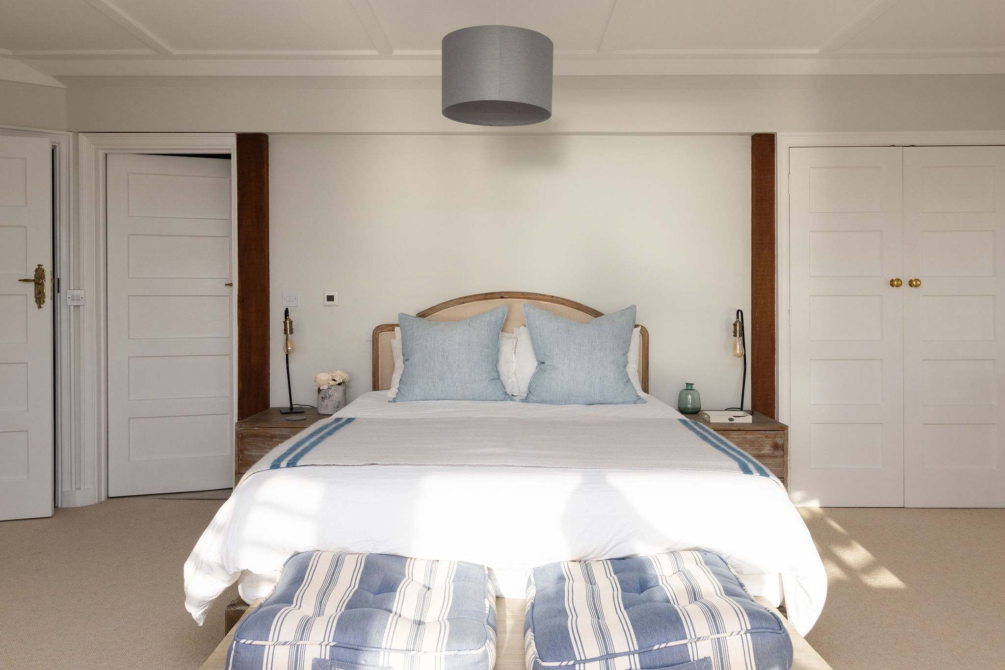 Spacious master king bed with wardrobes for your storing your personal belongings!