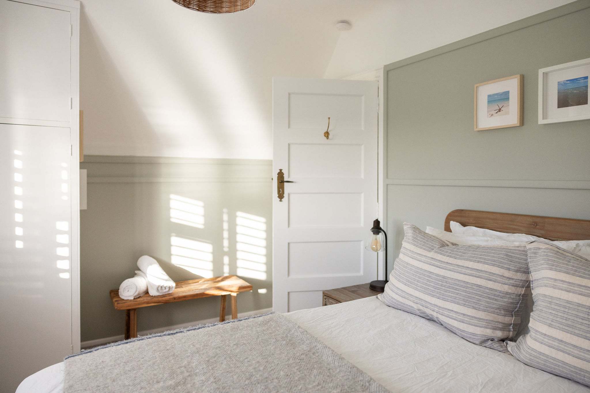 Stylish double bedroom with calm decor.