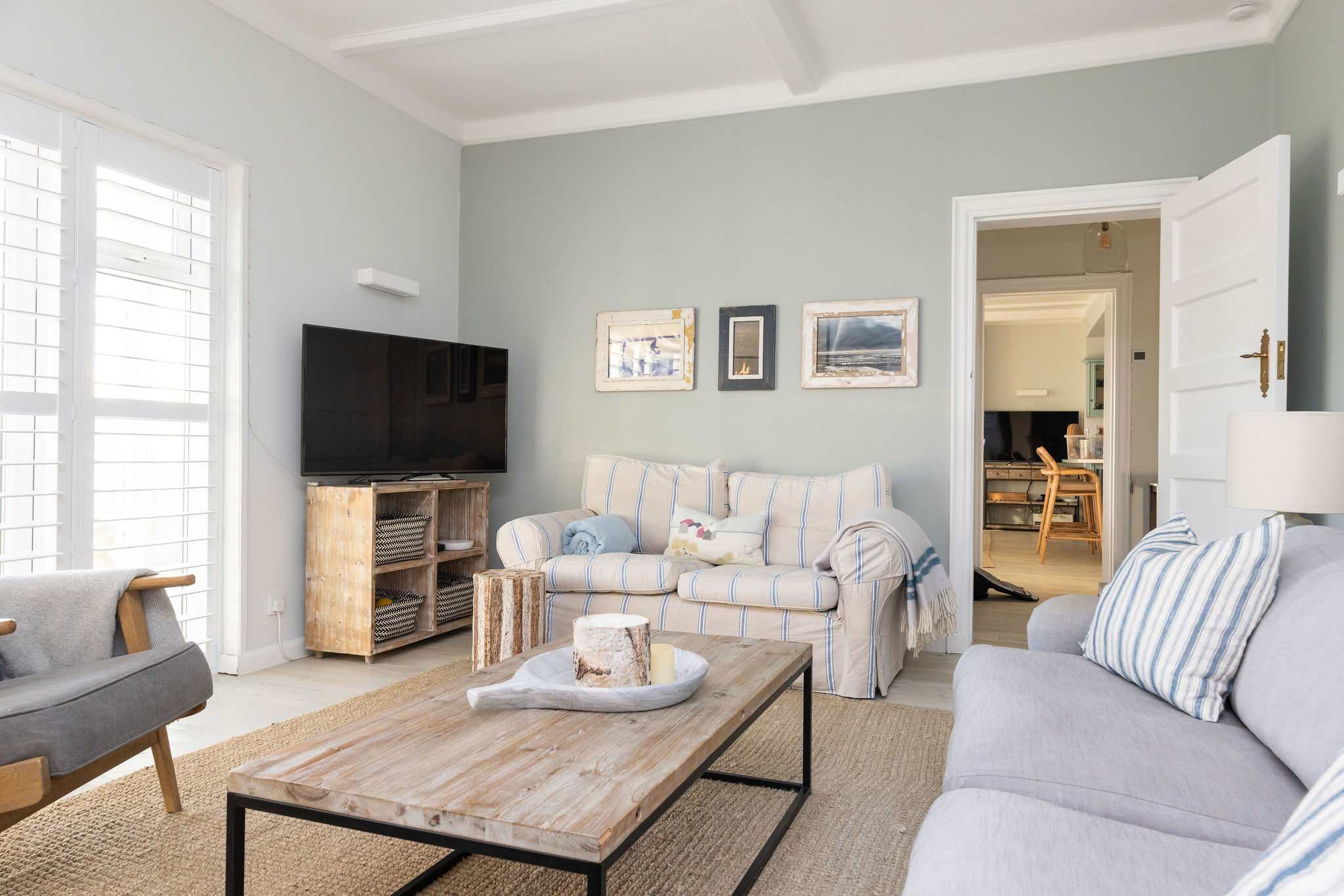 This family lounge with large TV is the perfect space for all to enjoy!