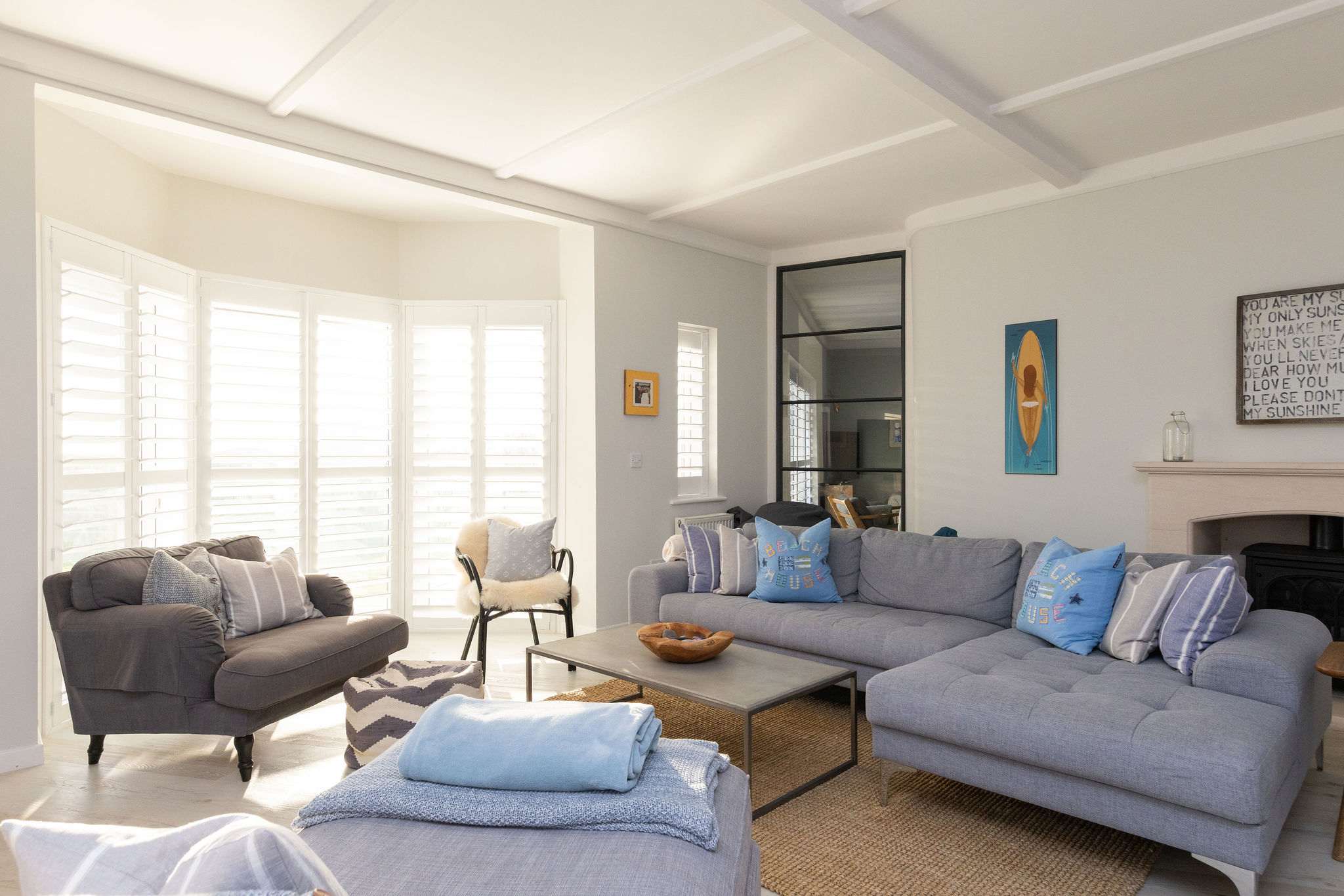 Comfortable lounge with a small fireplace.