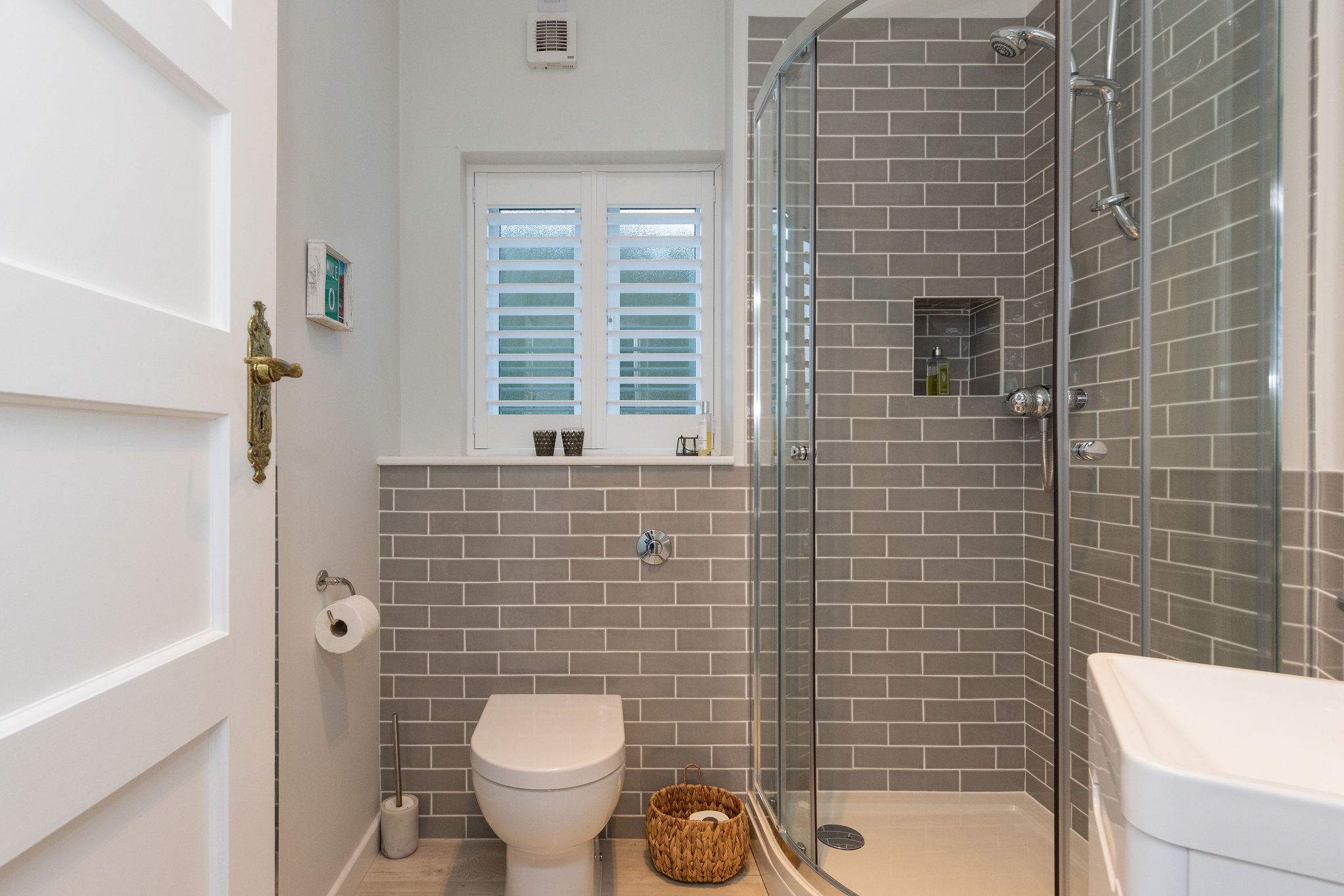 Modern bathroom with walk-in shower.