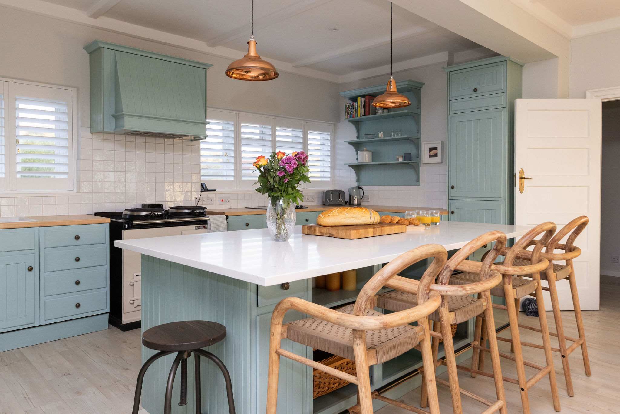 Enjoy your morning coffee at the breakfast bar with seating for four.