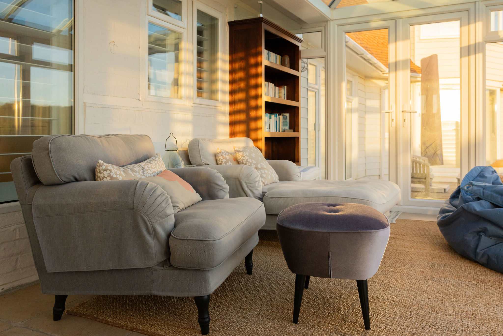 Sunny reading nook with garden views.
