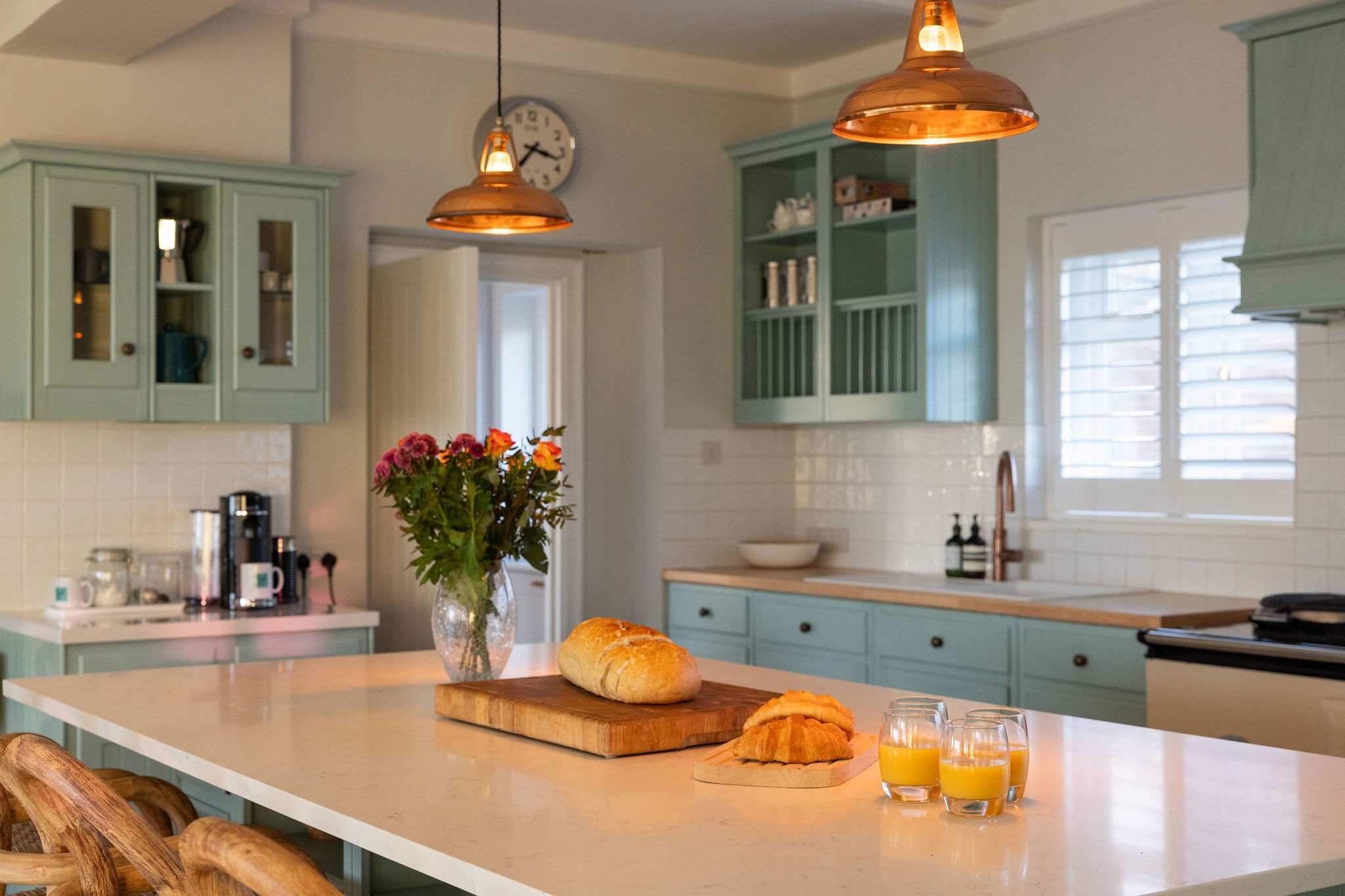 Modern kitchen with Nespresso coffee machine.