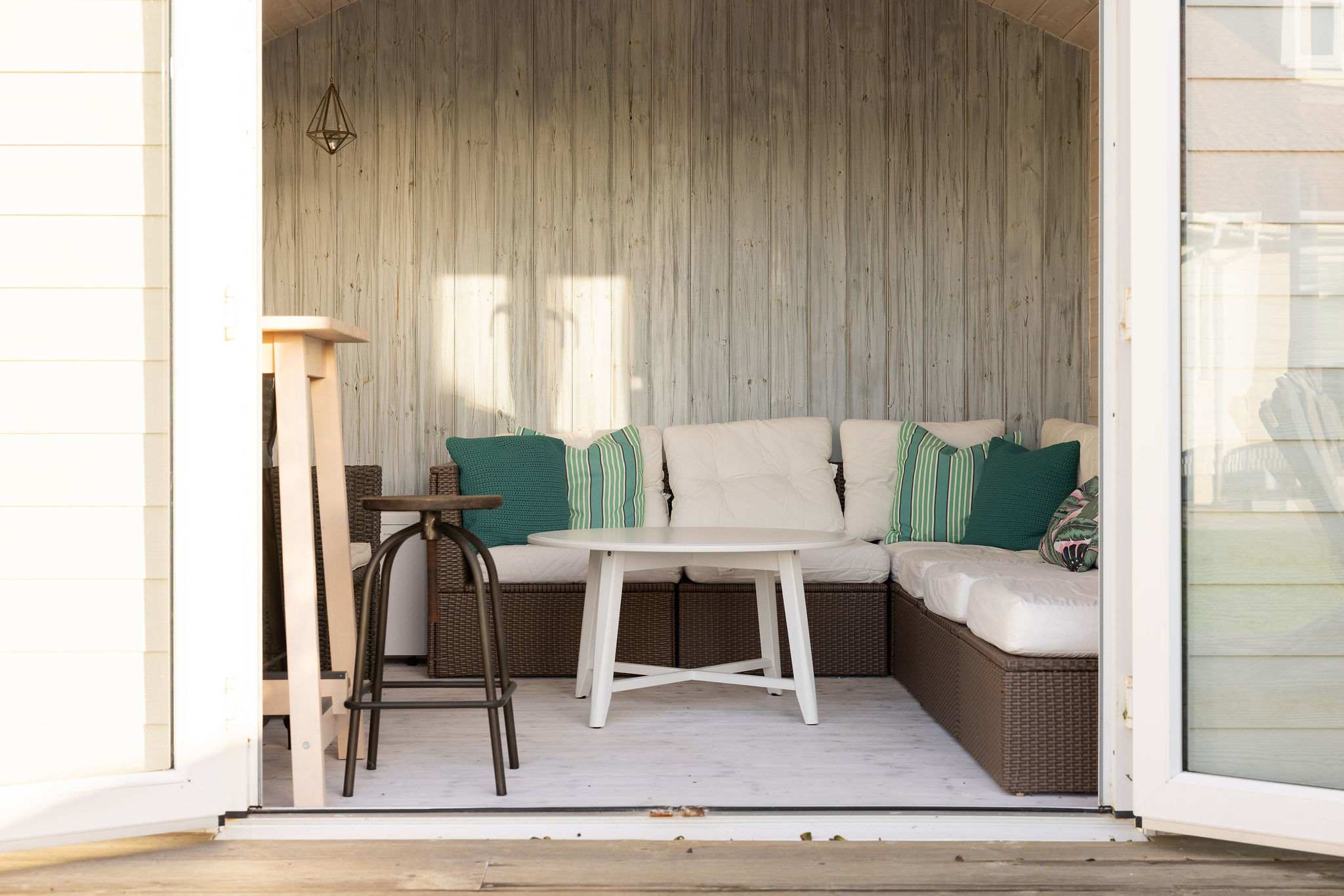 Enjoy the garden summer house with seating.