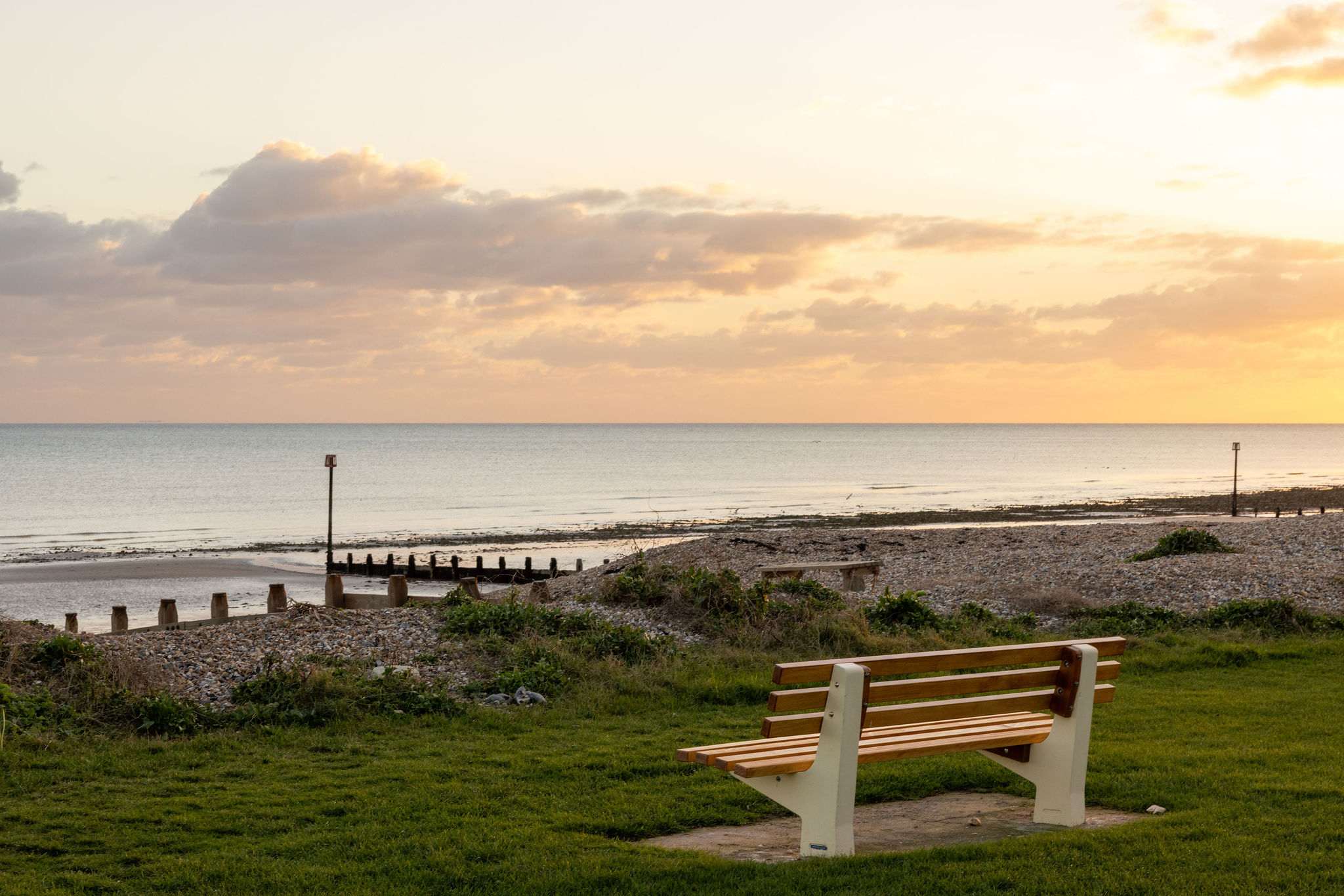 Peaceful bench overlooking the beach.