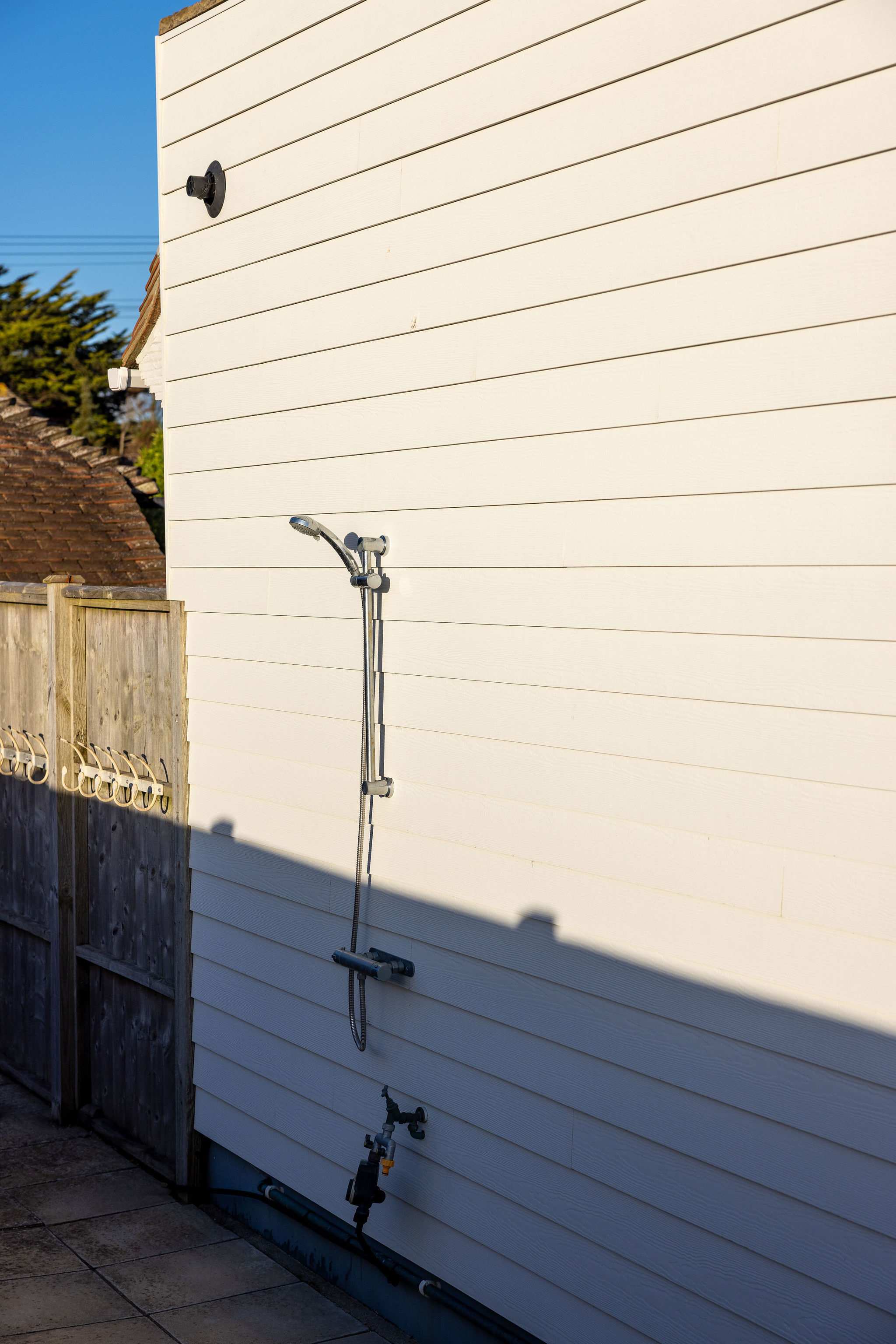 Outdoor shower for rinsing off sand.