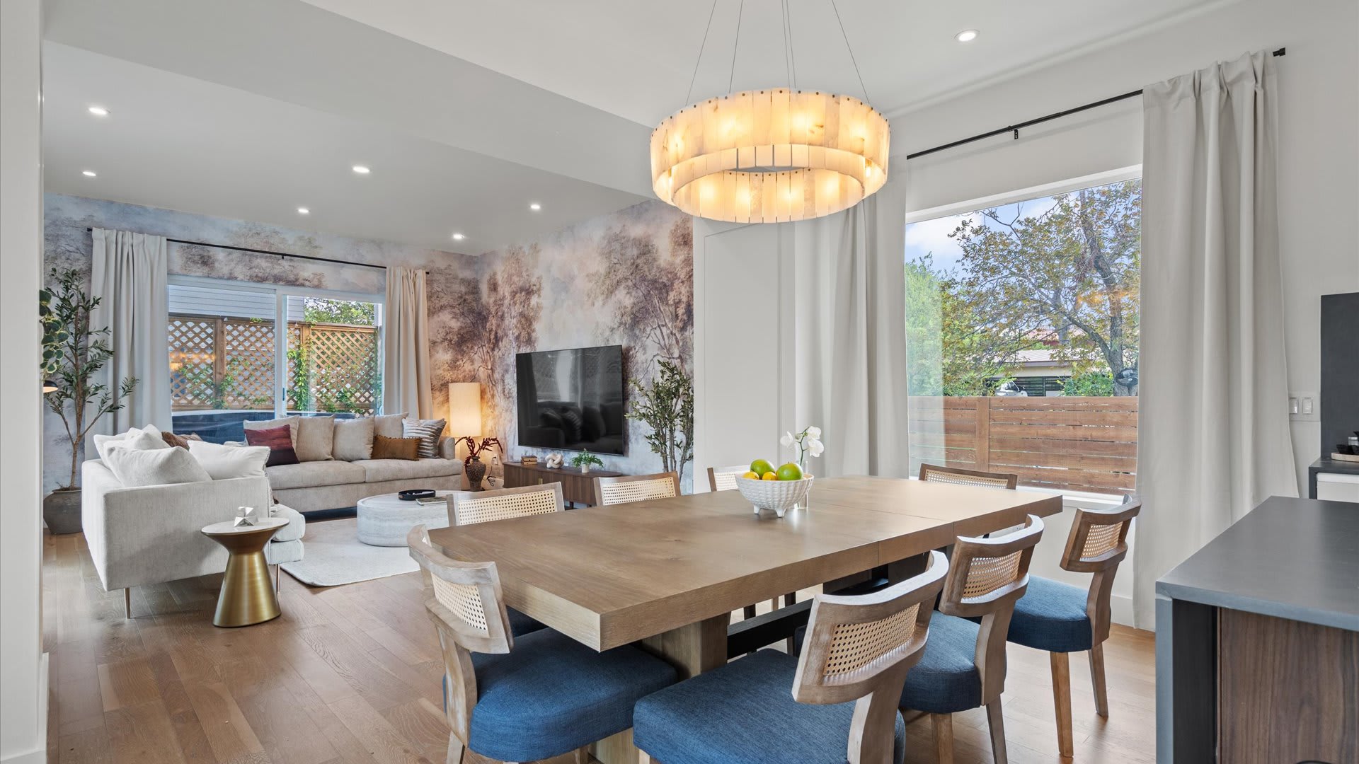 Dining room with elegant statement lighting