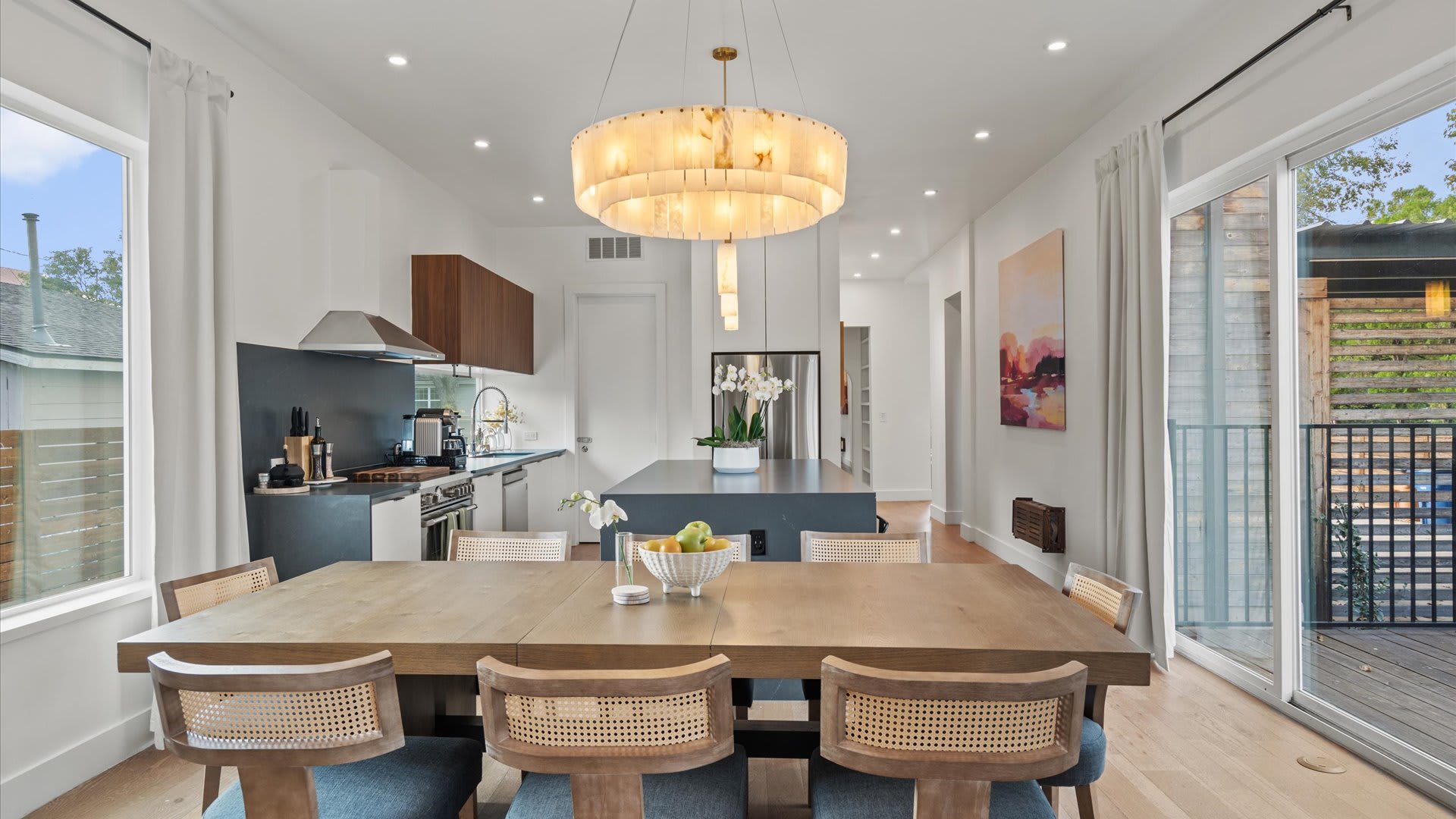 Dining room with elegant statement lighting