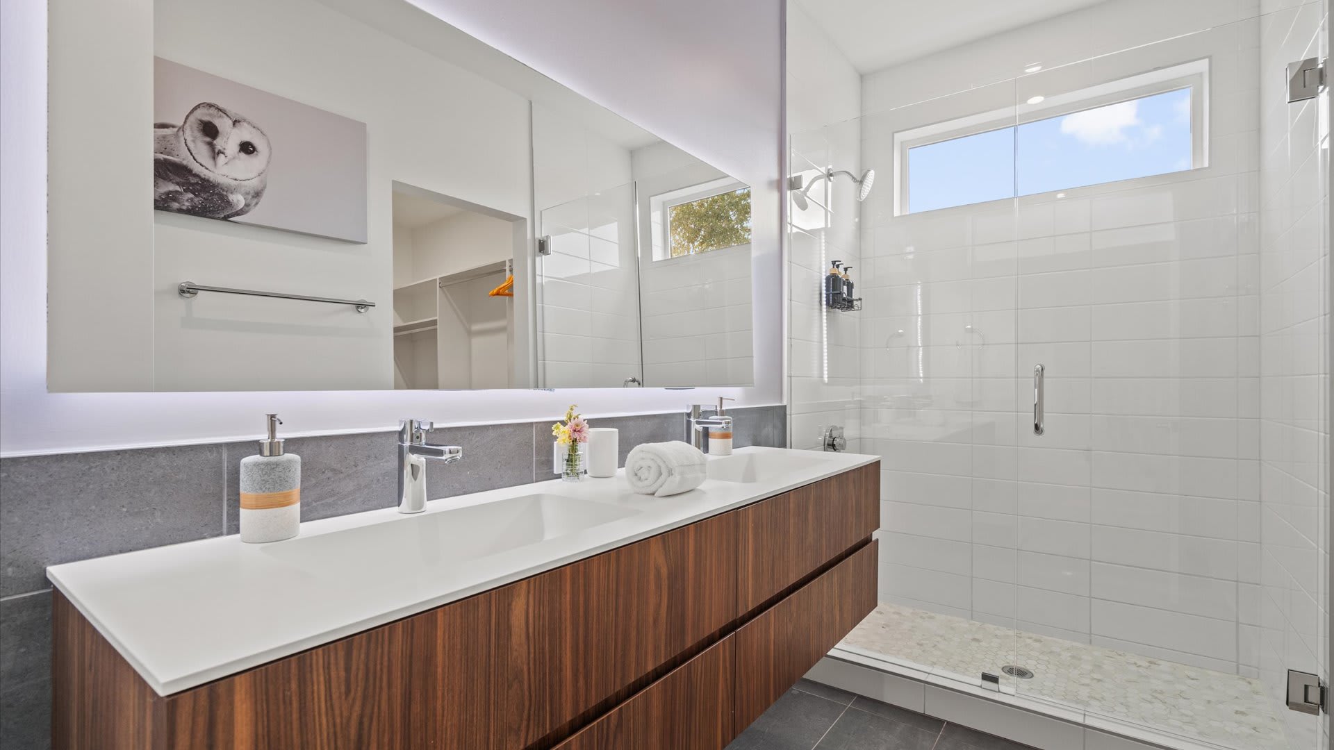 Luxurious ensuite with dual sinks and a spacious vanity