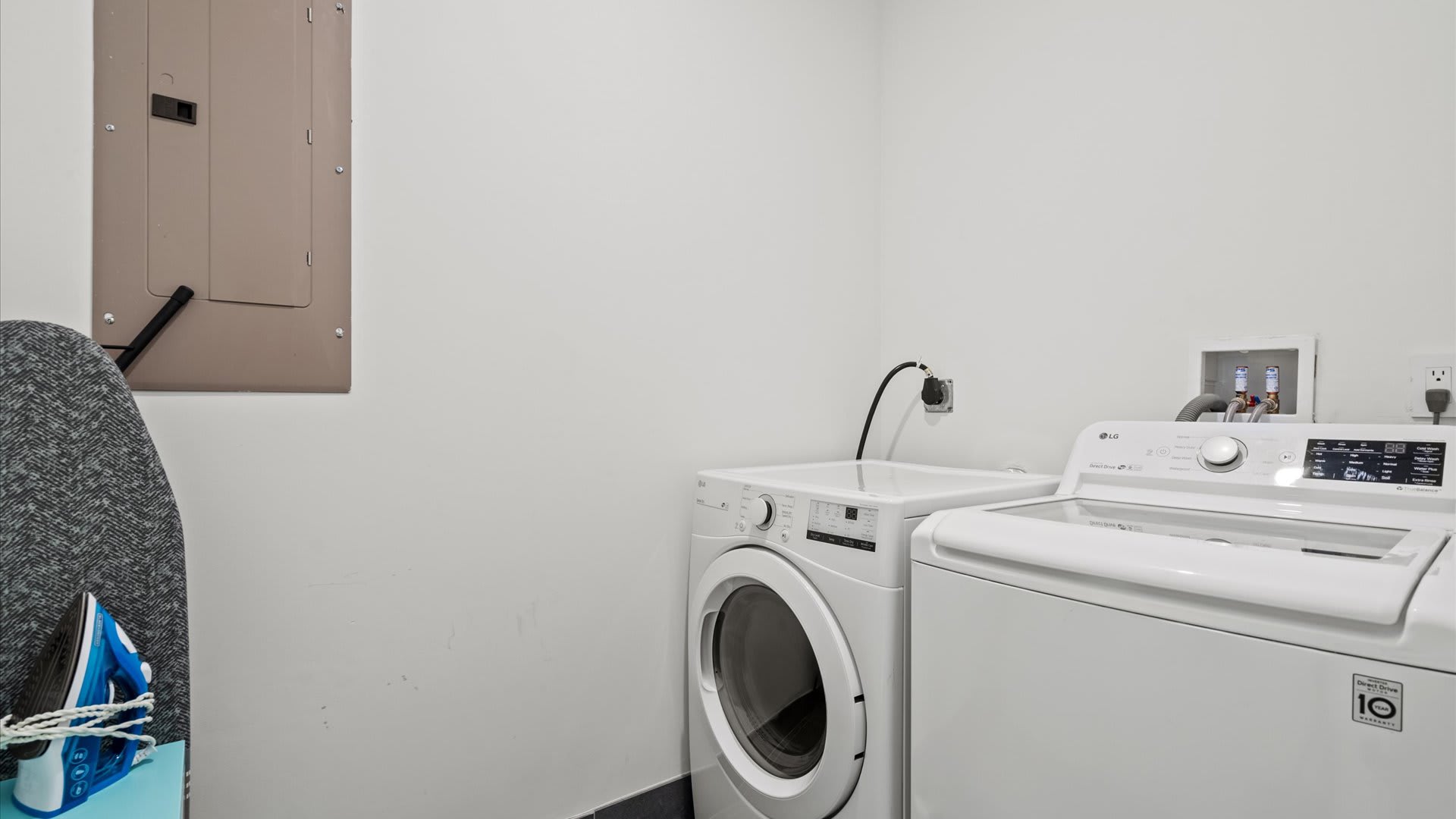 Dedicated laundry room with washer and dryer