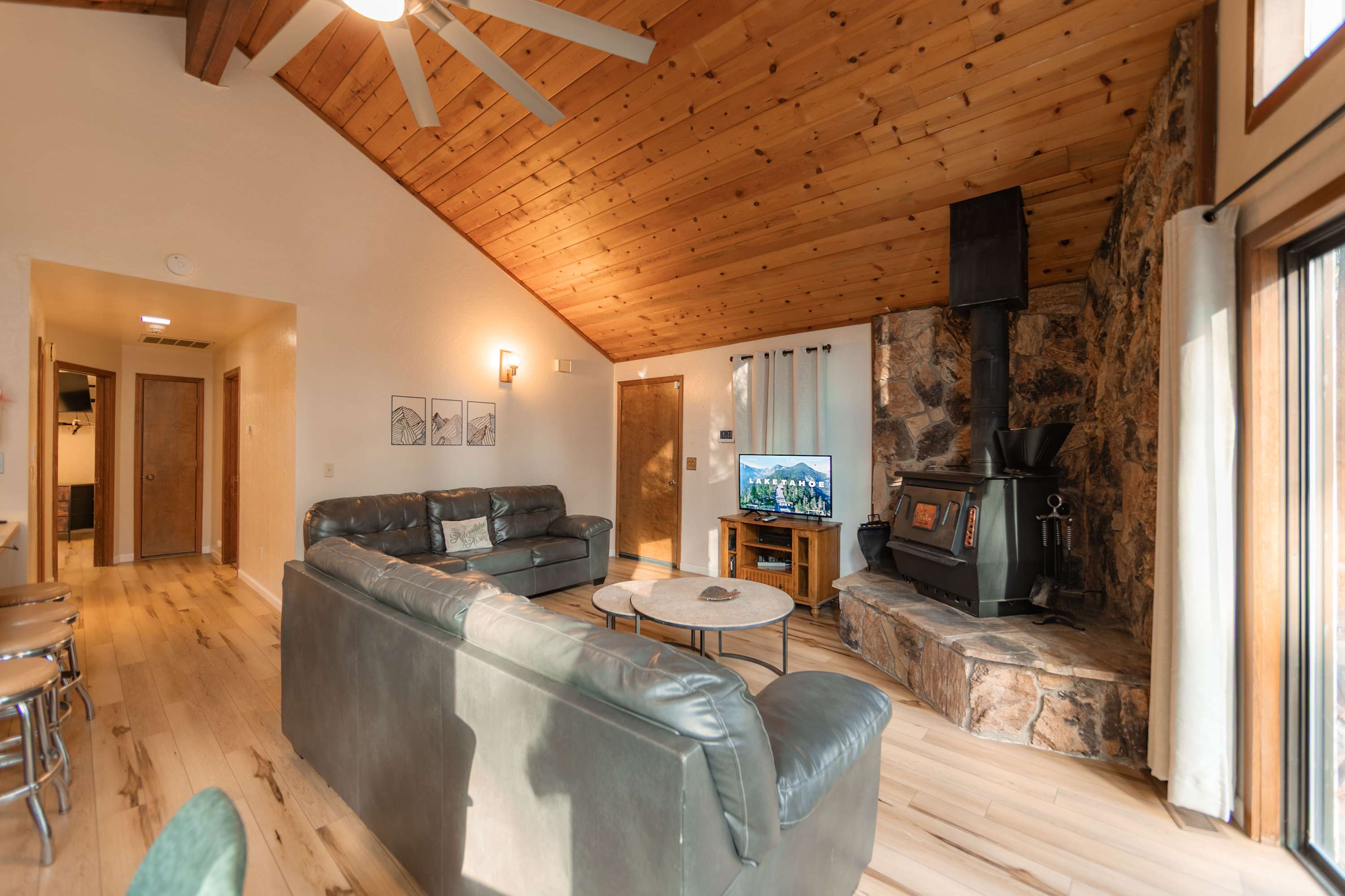 Relax, stream, and unwind by the wood burning fireplace 