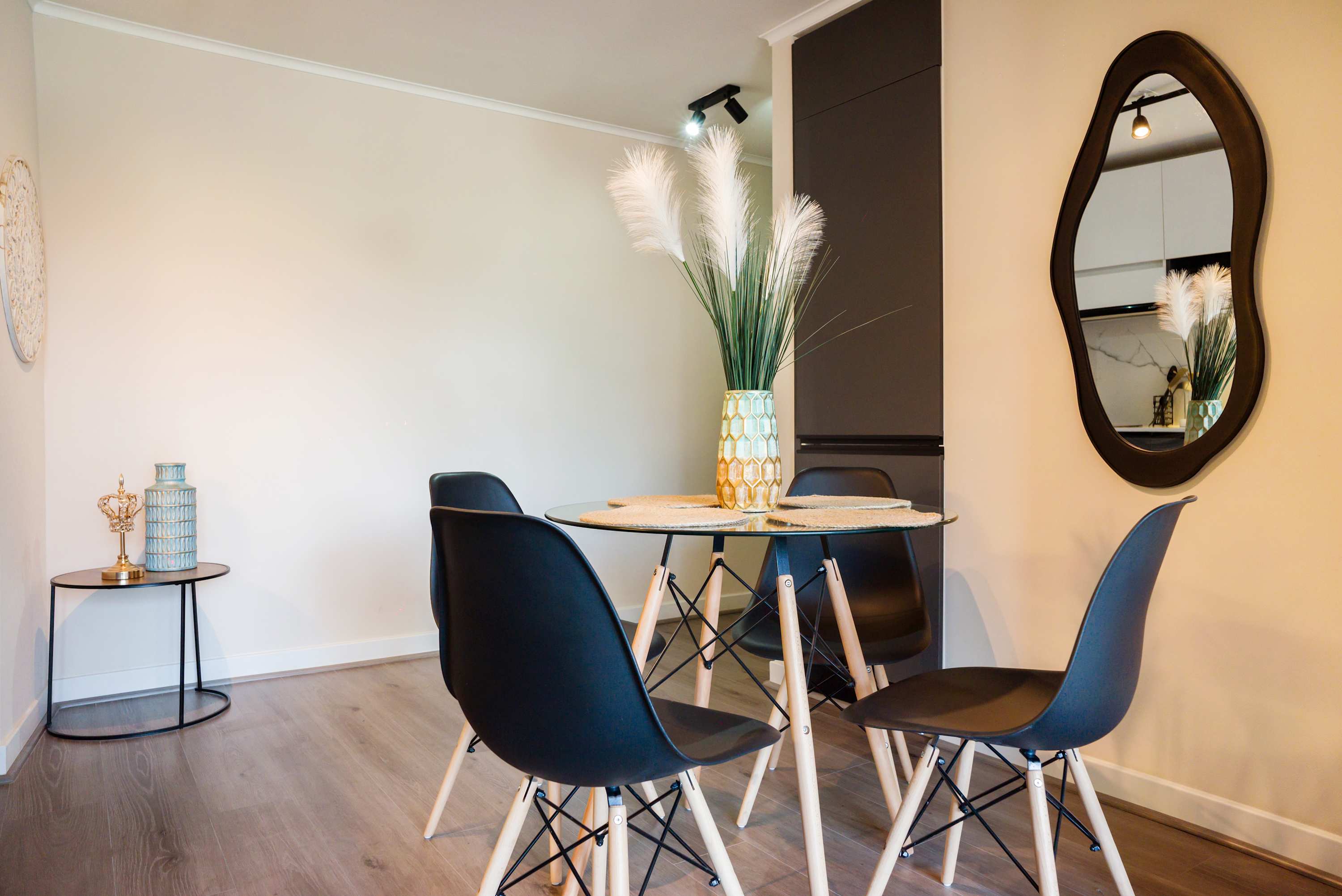 Chic dining area with modern decor and elegant touches, perfect for intimate meals.