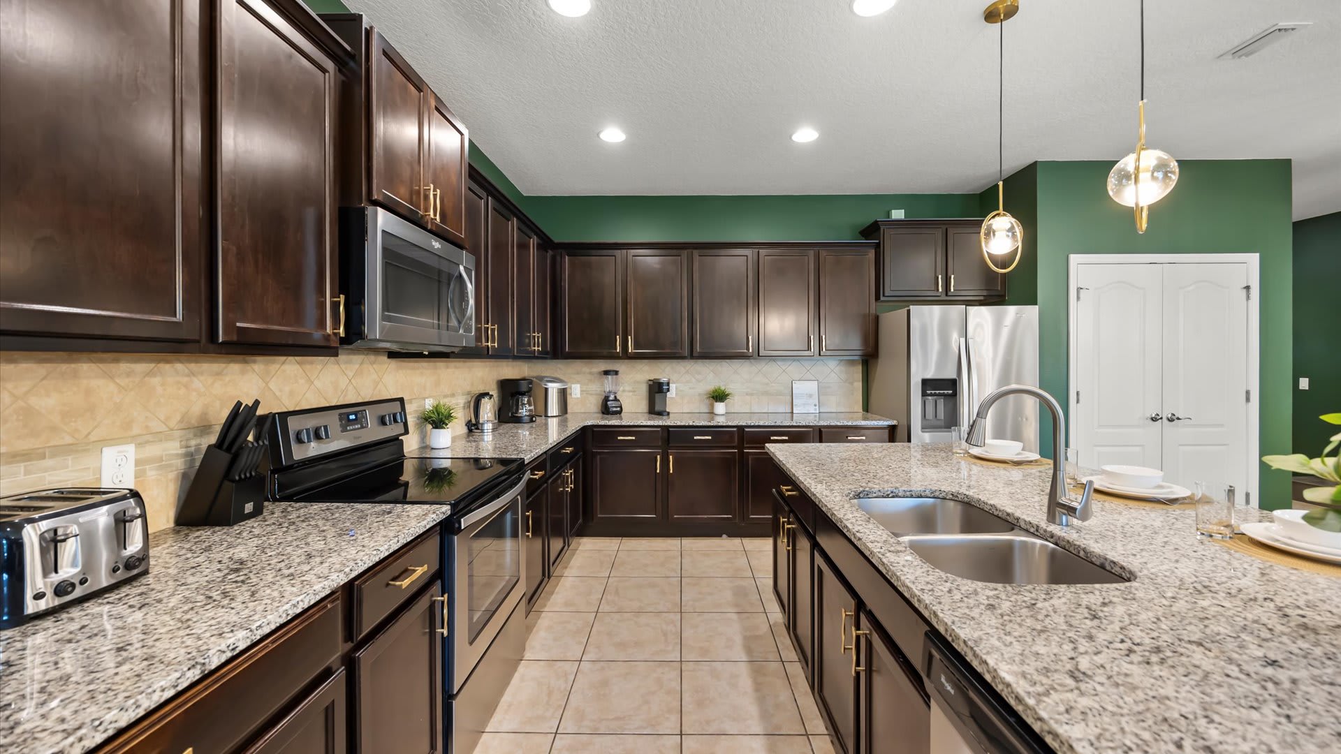 Fully Equipped Modern Kitchen – Spacious, sleek, and stocked with everything you need to cook for a crowd.