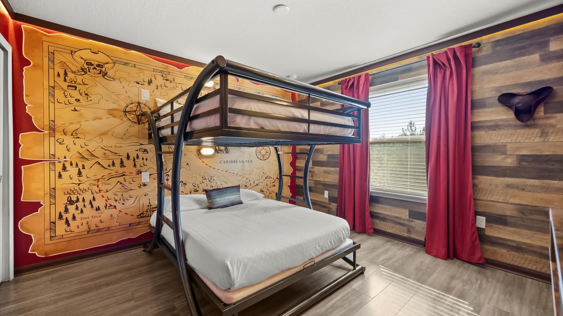 Pirate Adventure Bedroom – A bold themed room with a ship-style bunk bed and vibrant décor.