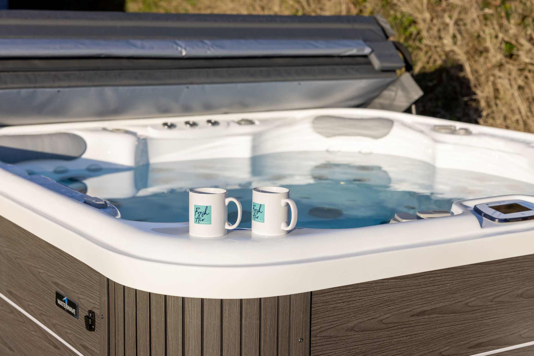 Private hot tub for ultimate relaxation (£150 surcharge).