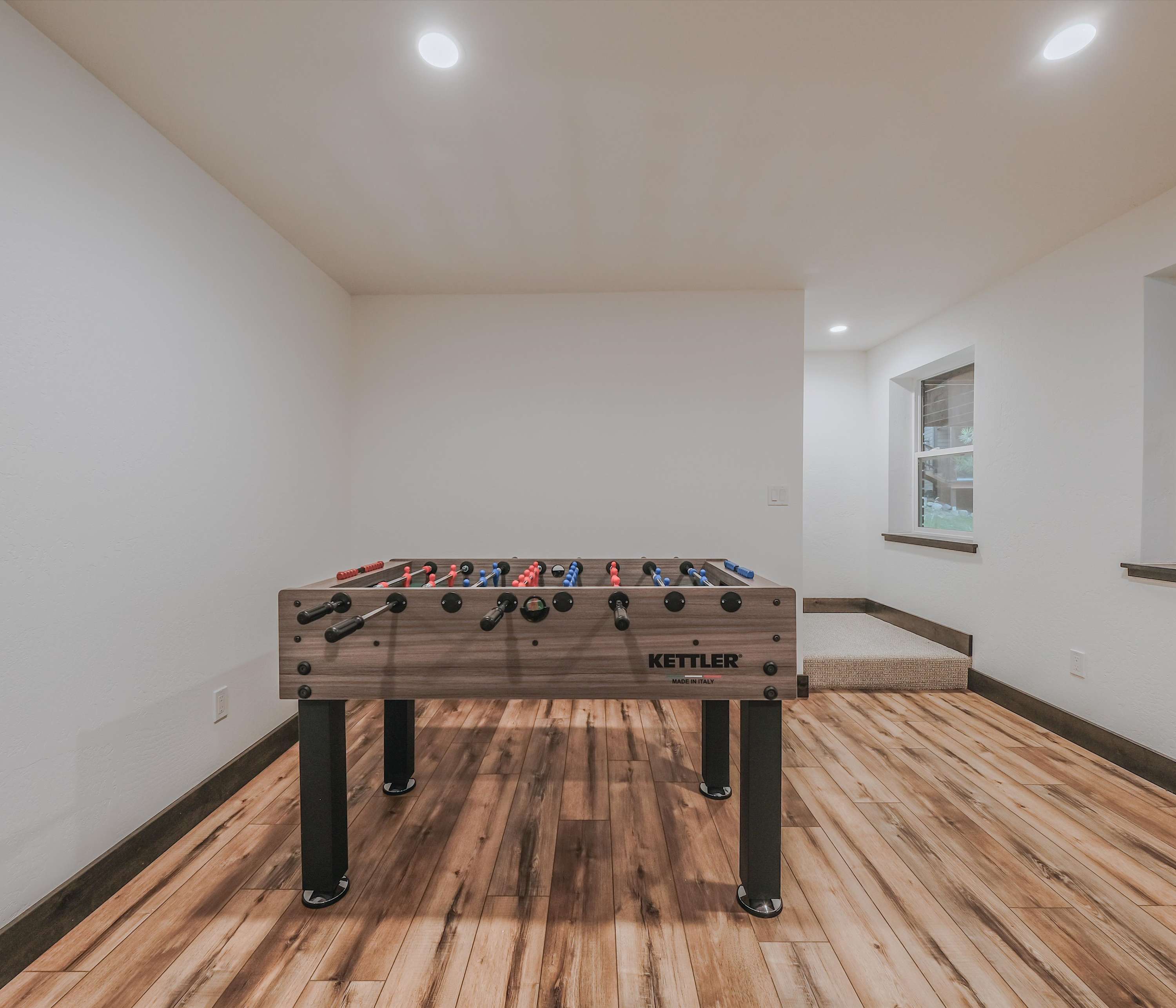 Hours of entertainment await in the basement game room