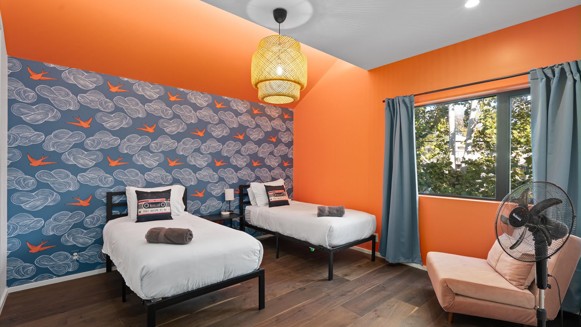 Vibrant Twin Room With Modern Accents And Colorful Details